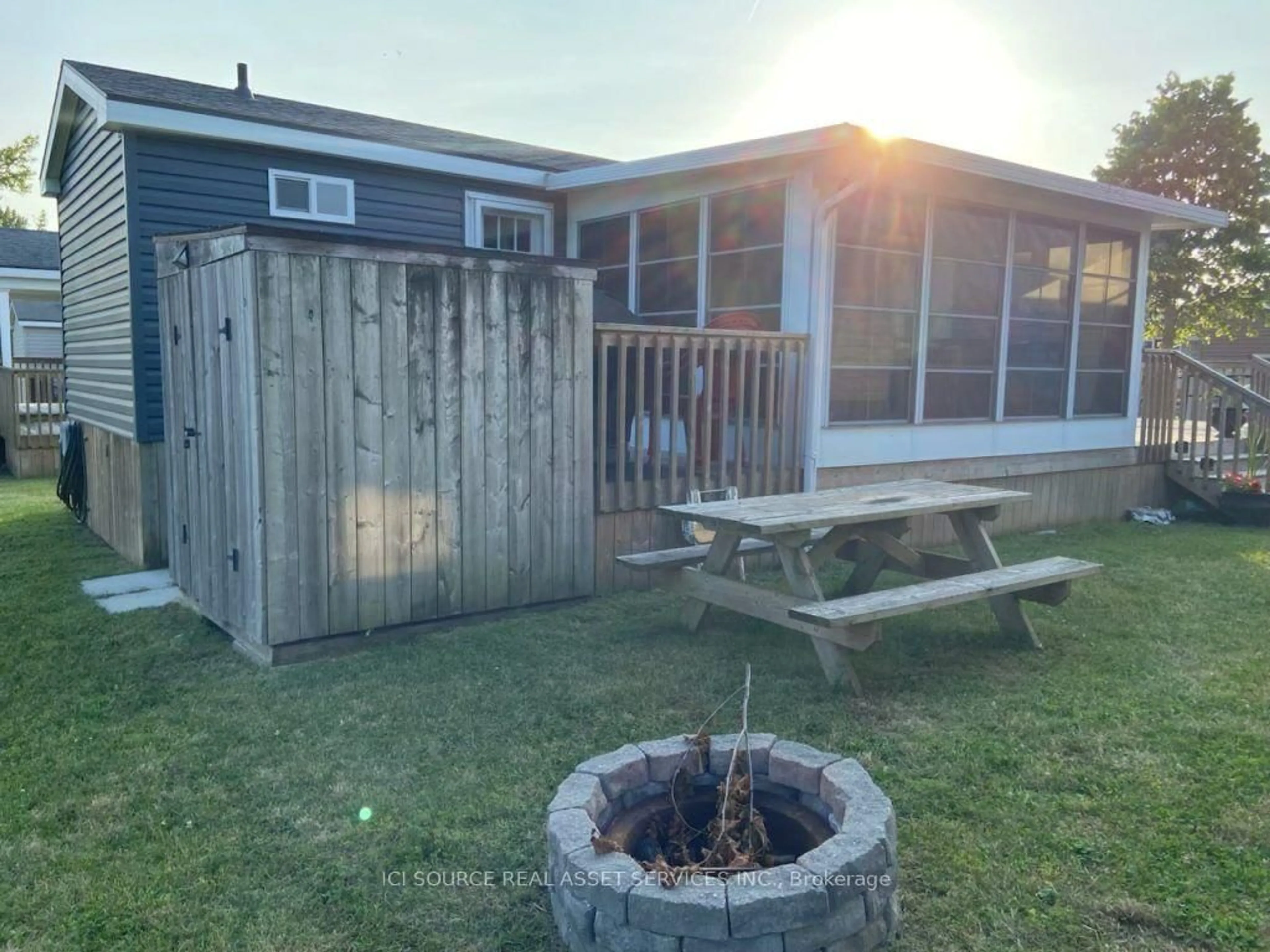 A pic from outside/outdoor area/front of a property/back of a property/a pic from drone, unknown for 486 County Road 18 #CRL06, Prince Edward County Ontario K0K 1P0