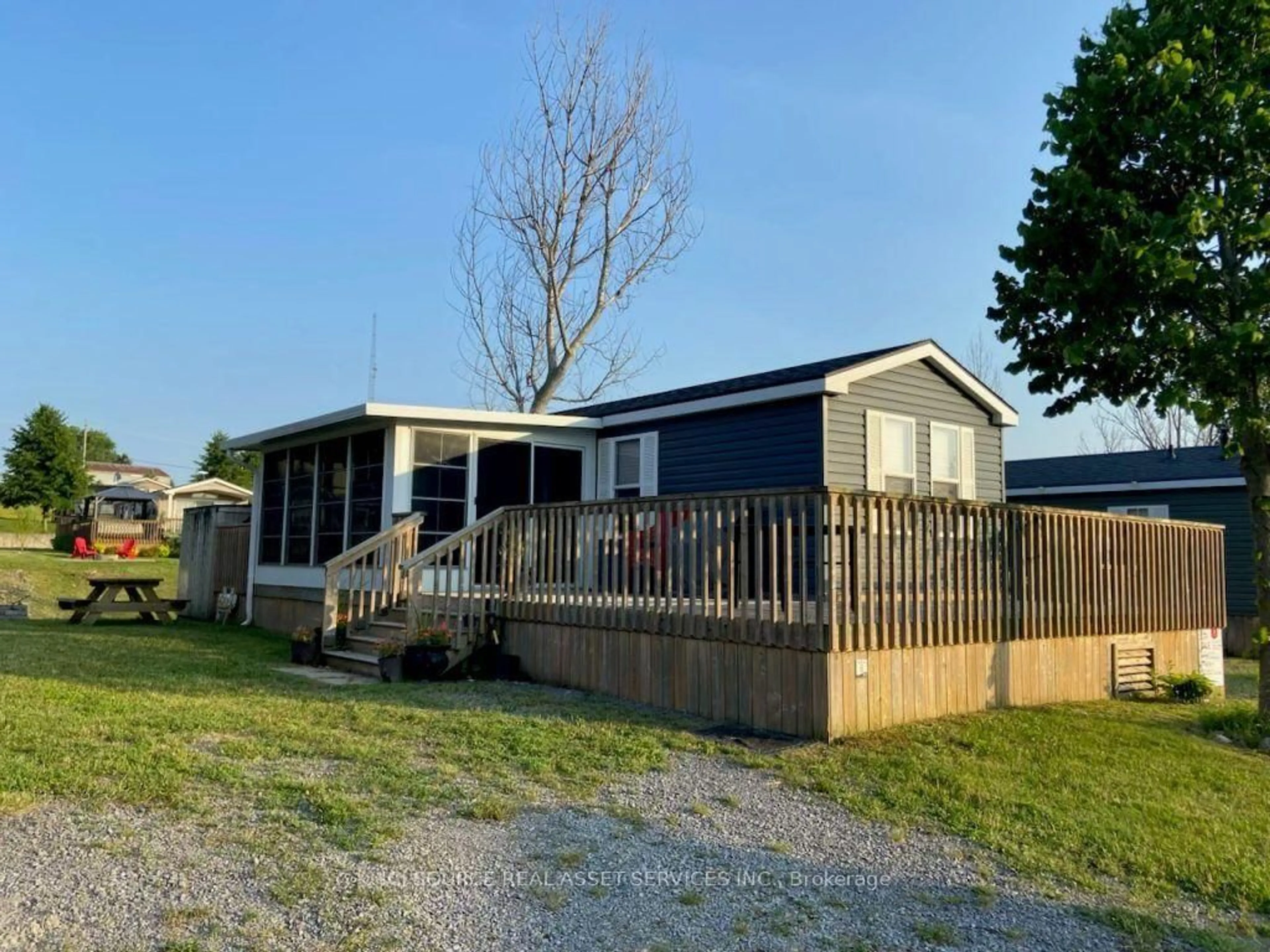 A pic from outside/outdoor area/front of a property/back of a property/a pic from drone, unknown for 486 County Road 18 #CRL06, Prince Edward County Ontario K0K 1P0