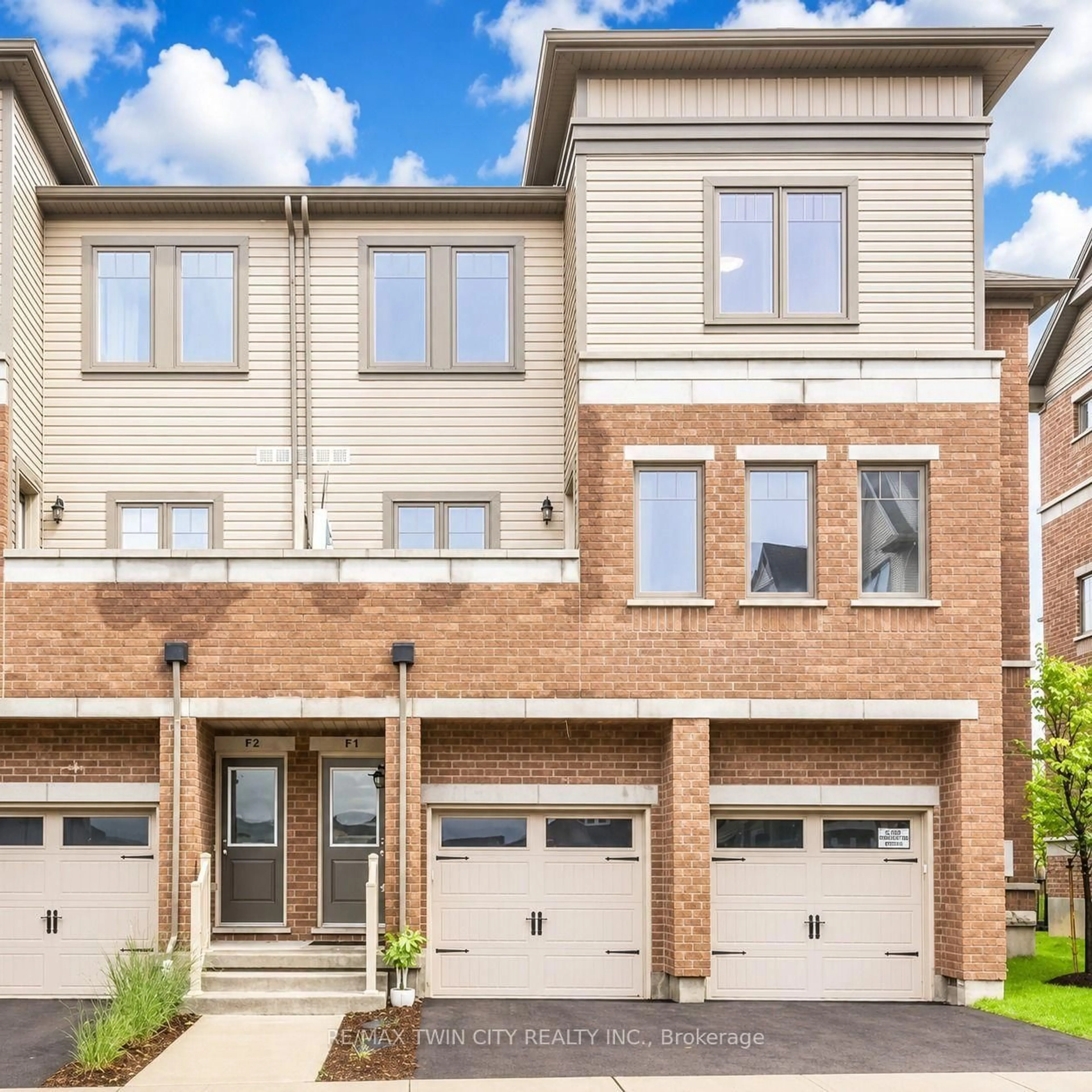 Home with brick exterior material, street for 70 Willowrun Dr #F1, Kitchener Ontario N2A 0J3