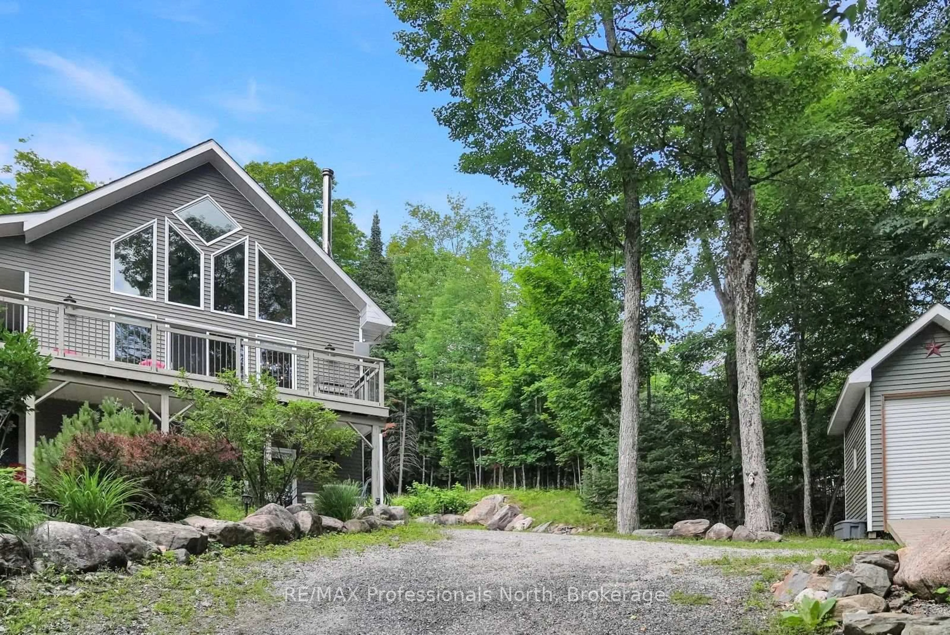 A pic from outside/outdoor area/front of a property/back of a property/a pic from drone, unknown for 1311 Wonderland Rd, Dysart et al Ontario K0M 1S0