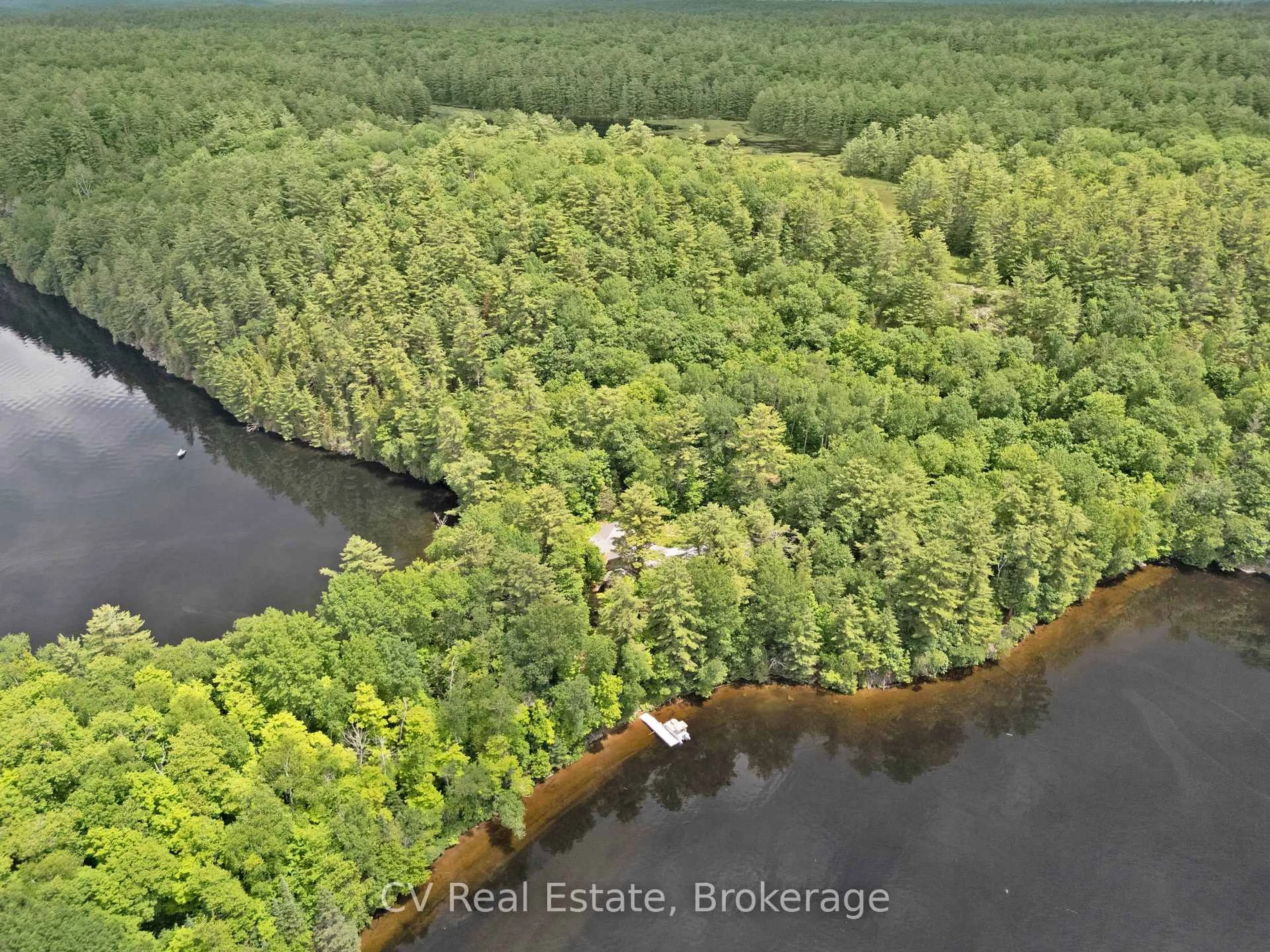 A pic from outside/outdoor area/front of a property/back of a property/a pic from drone, water/lake/river/ocean view for 11165 Kushog-North, Algonquin Highlands Ontario K0M 1J1
