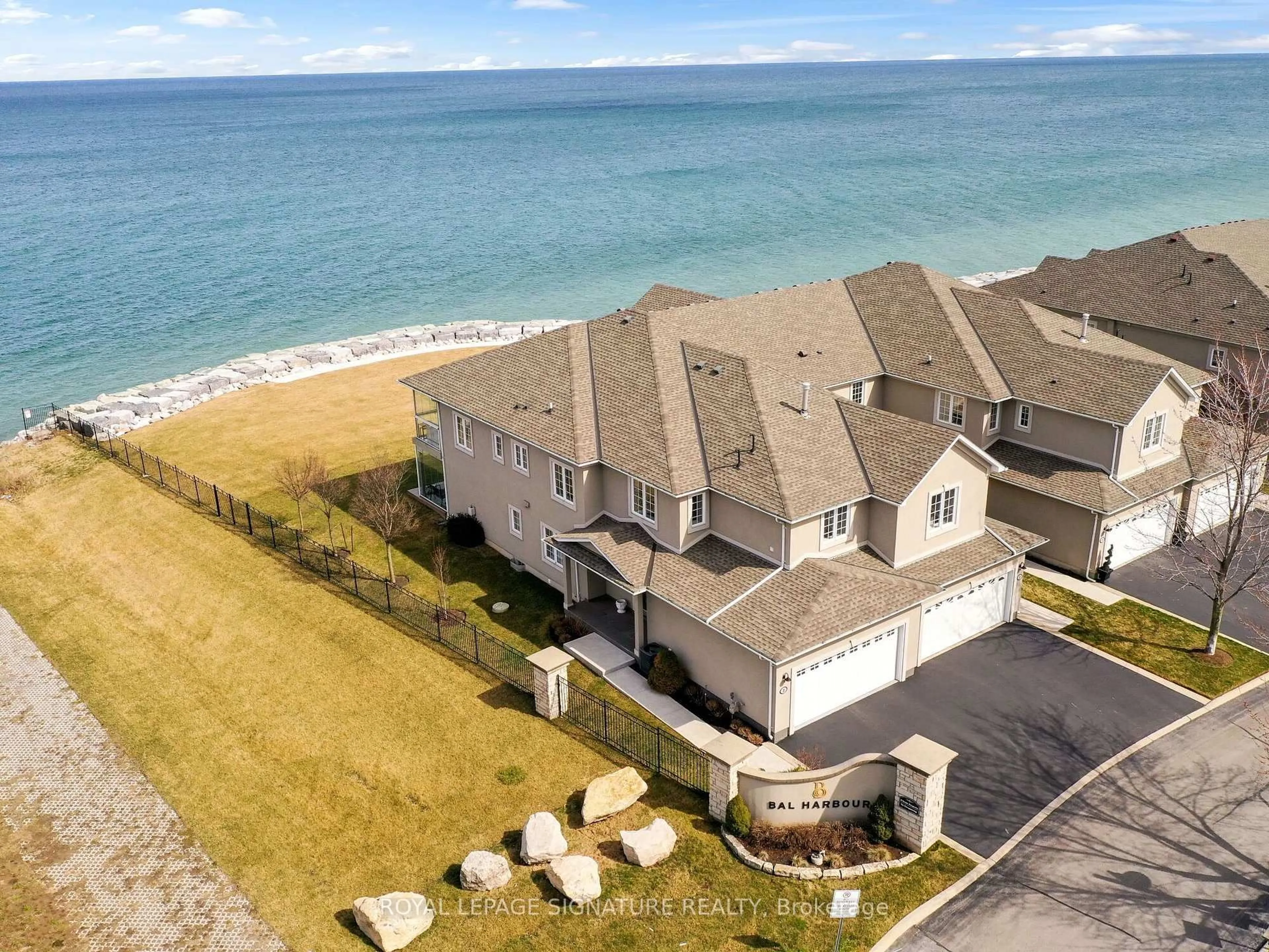 A pic from outside/outdoor area/front of a property/back of a property/a pic from drone, water/lake/river/ocean view for 484 Millen Rd #2, Hamilton Ontario L8E 6G4