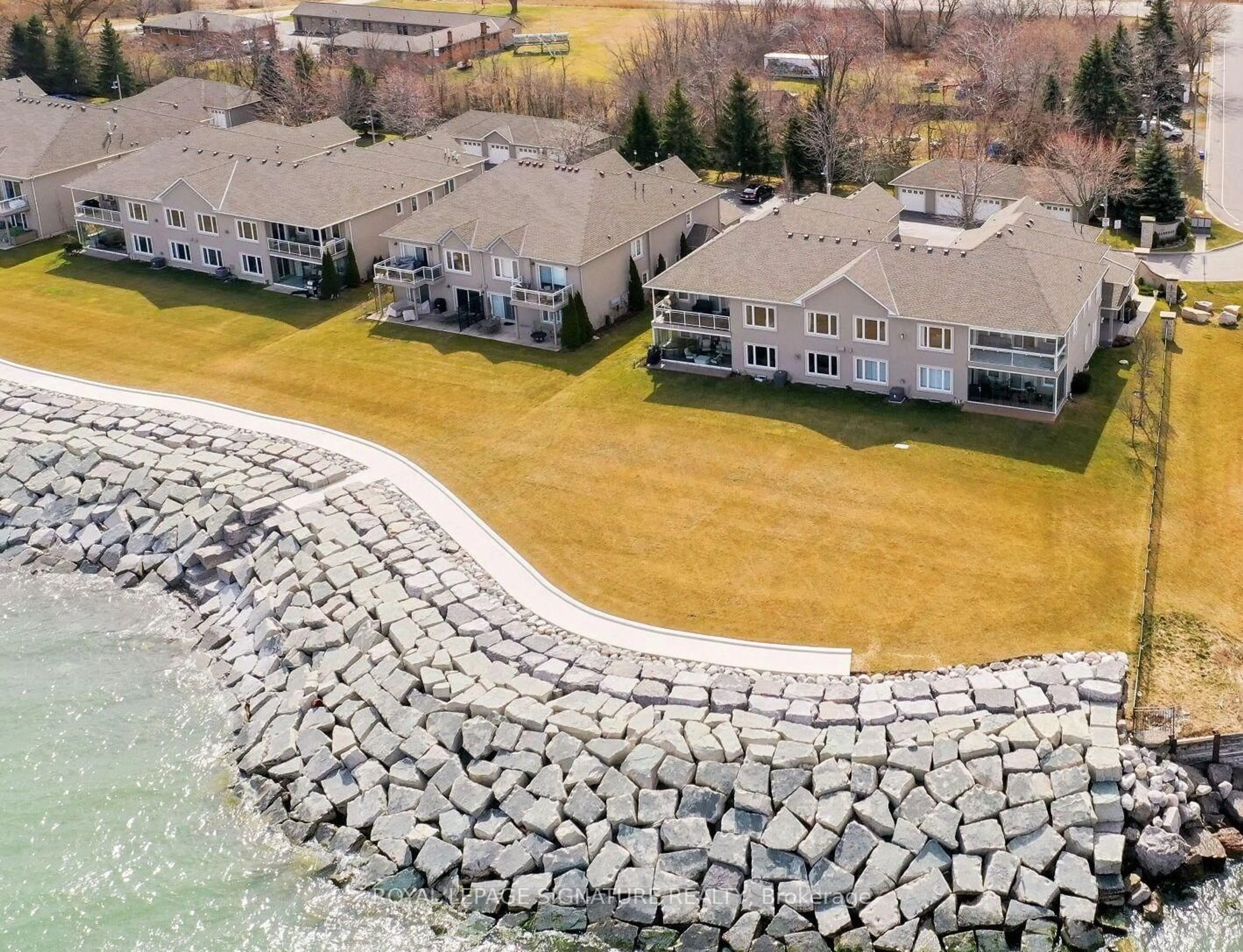A pic from outside/outdoor area/front of a property/back of a property/a pic from drone, water/lake/river/ocean view for 484 Millen Rd #2, Hamilton Ontario L8E 6G4