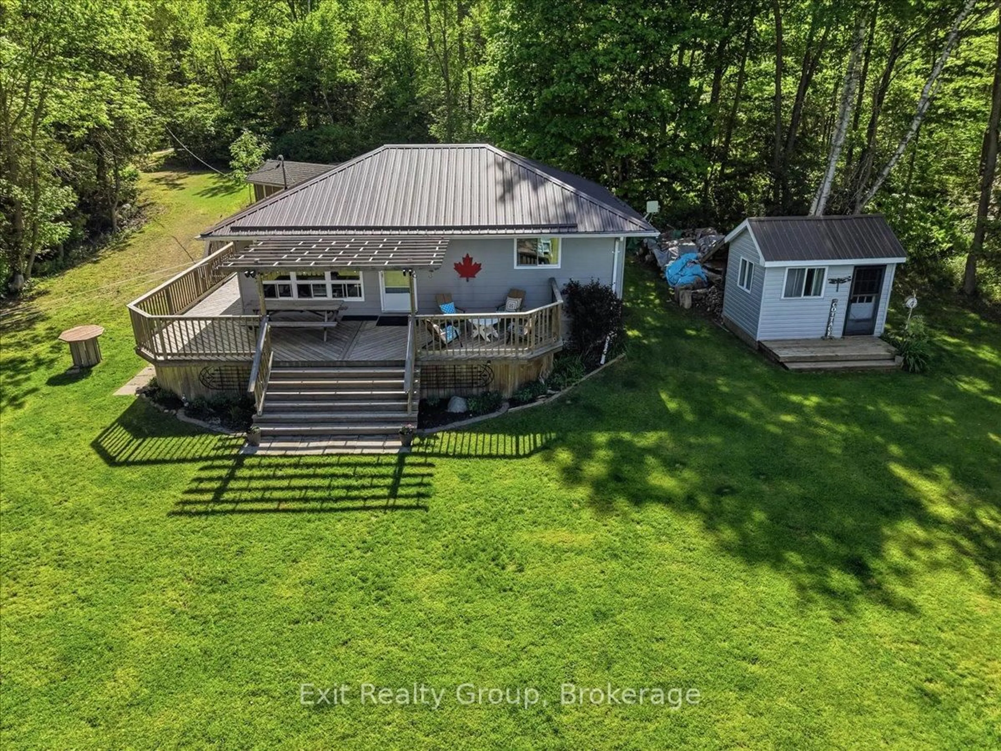 A pic from outside/outdoor area/front of a property/back of a property/a pic from drone, water/lake/river/ocean view for 14 Cedar Lane, Hastings Ontario K0K 2C0