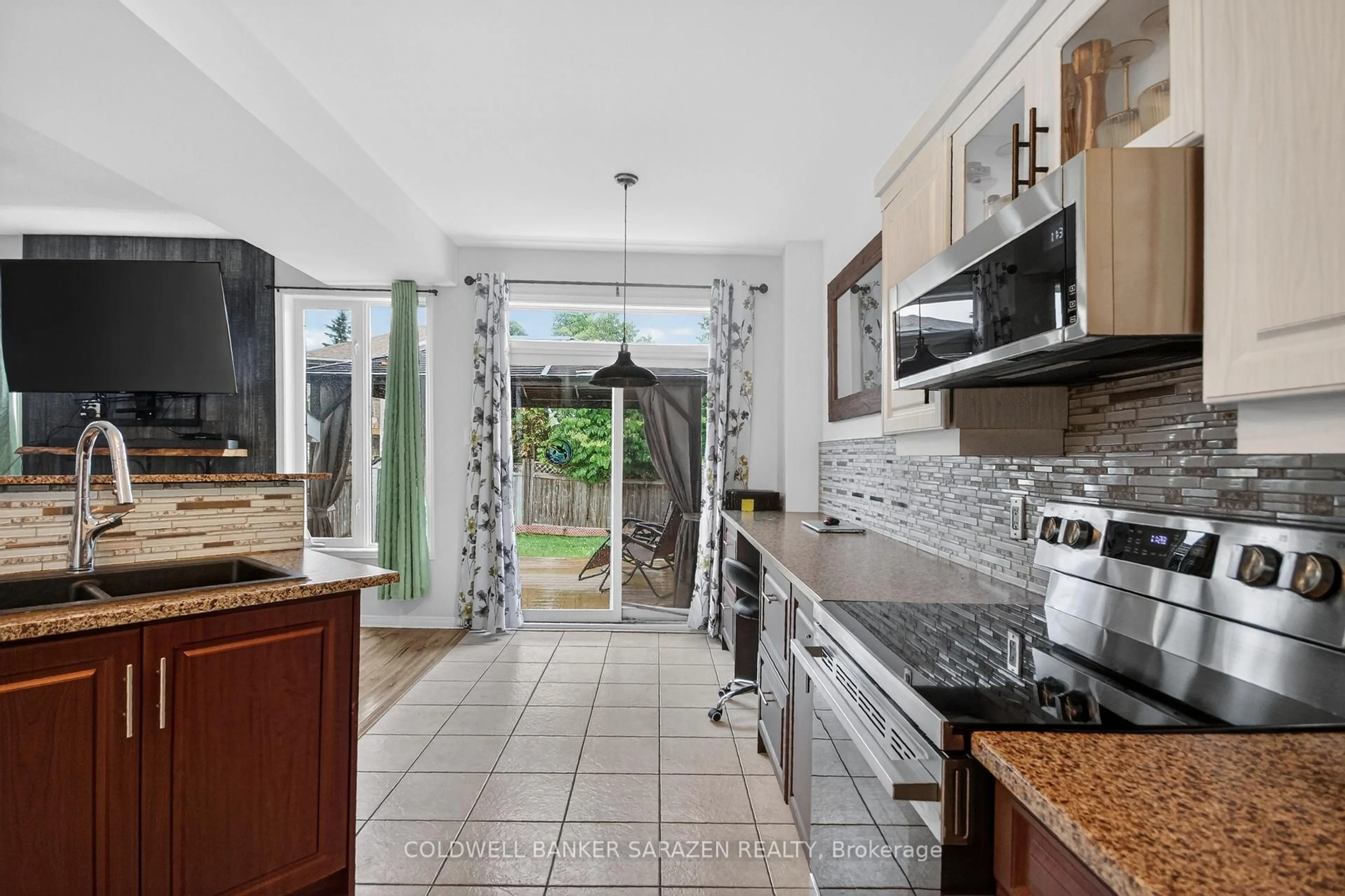 Open concept kitchen, ceramic/tile floor for 3 Castle Glen Cres, Ottawa Ontario K2L 4G9