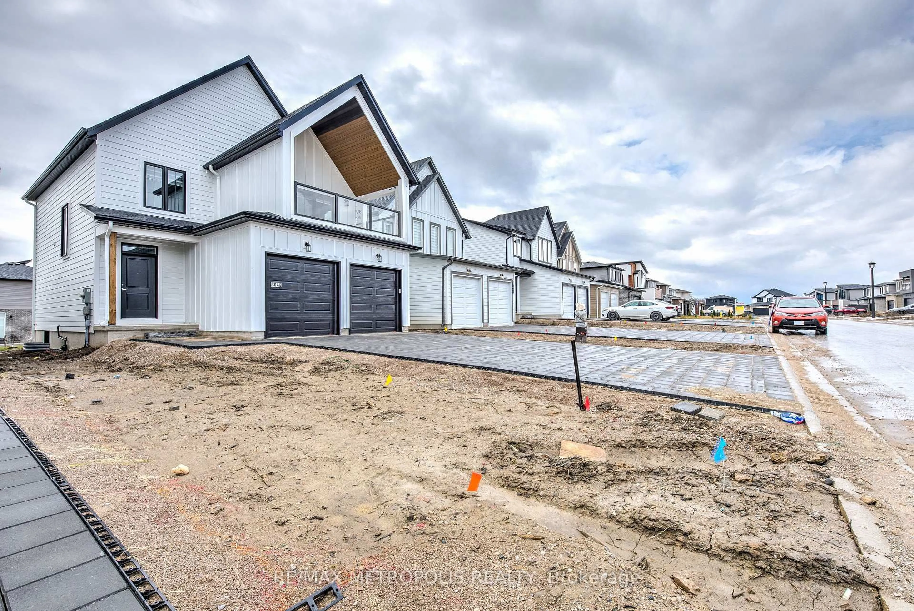 A pic from outside/outdoor area/front of a property/back of a property/a pic from drone, street for 3046 Heardcreek Tr, London North Ontario N6G 2S7