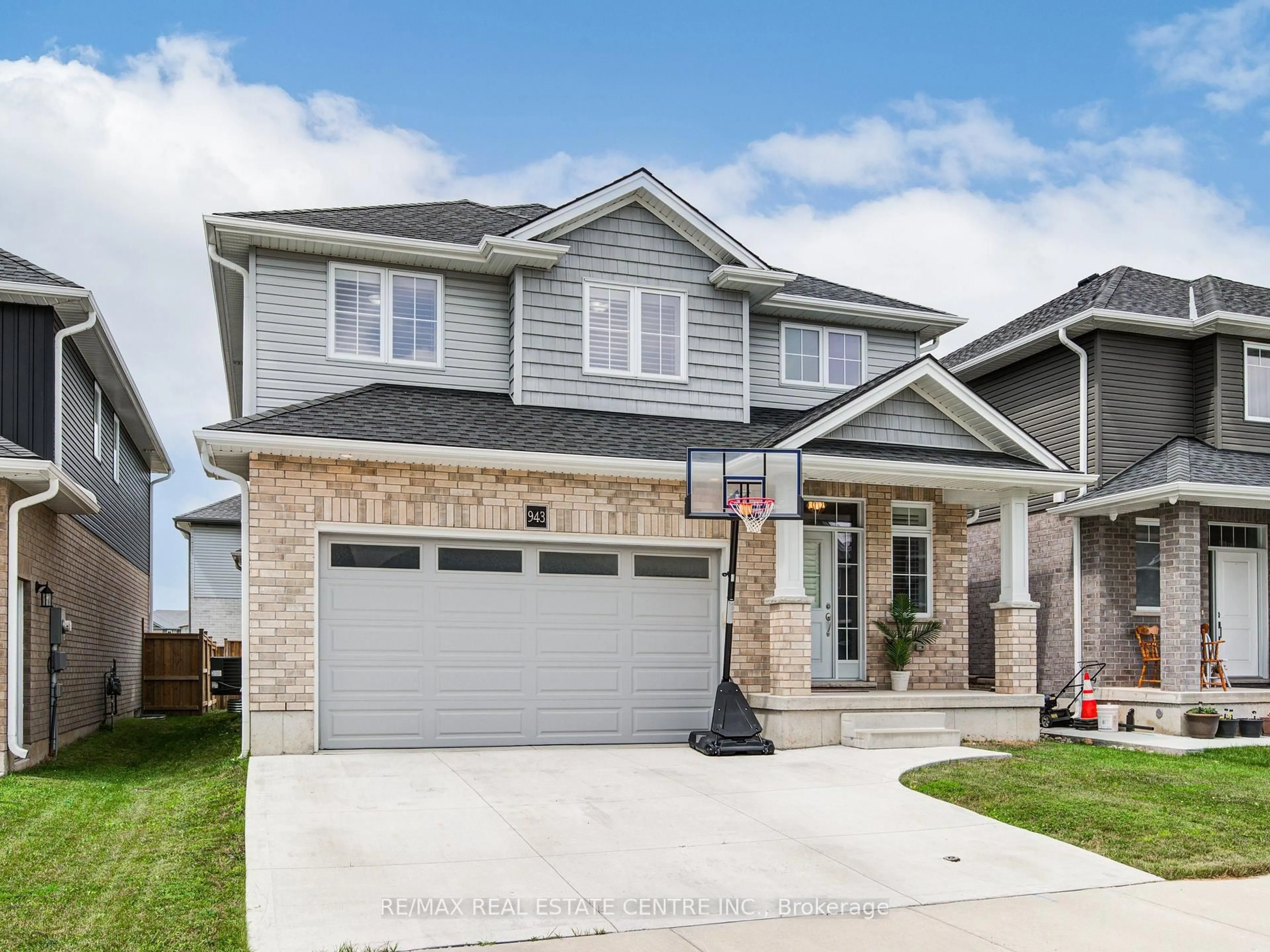 Home with brick exterior material, street for 943 Downing Dr, Woodstock Ontario N4T 0E1
