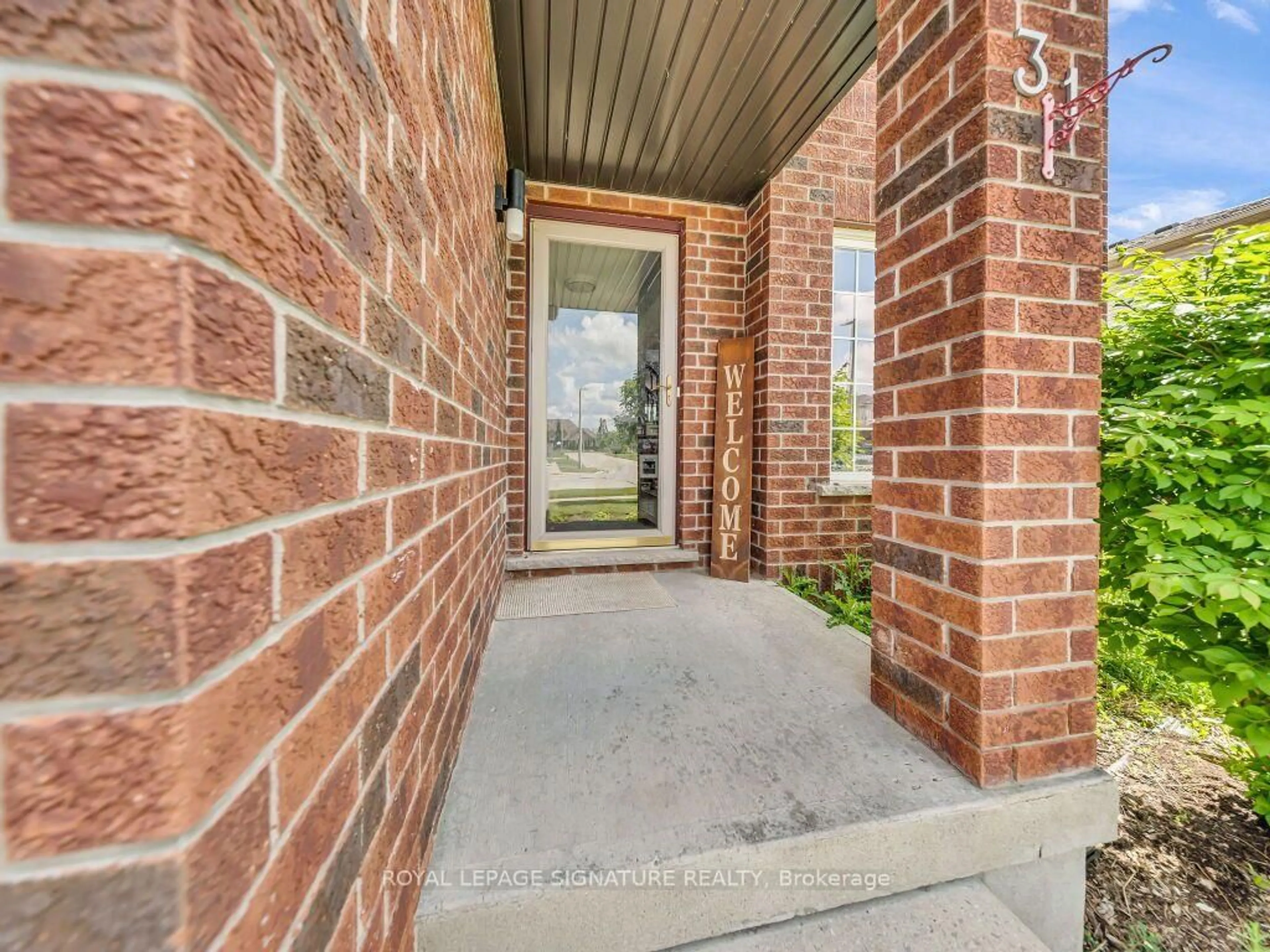 Home with brick exterior material, street for 31 Ingram Dr, Guelph Ontario N1E 0B1