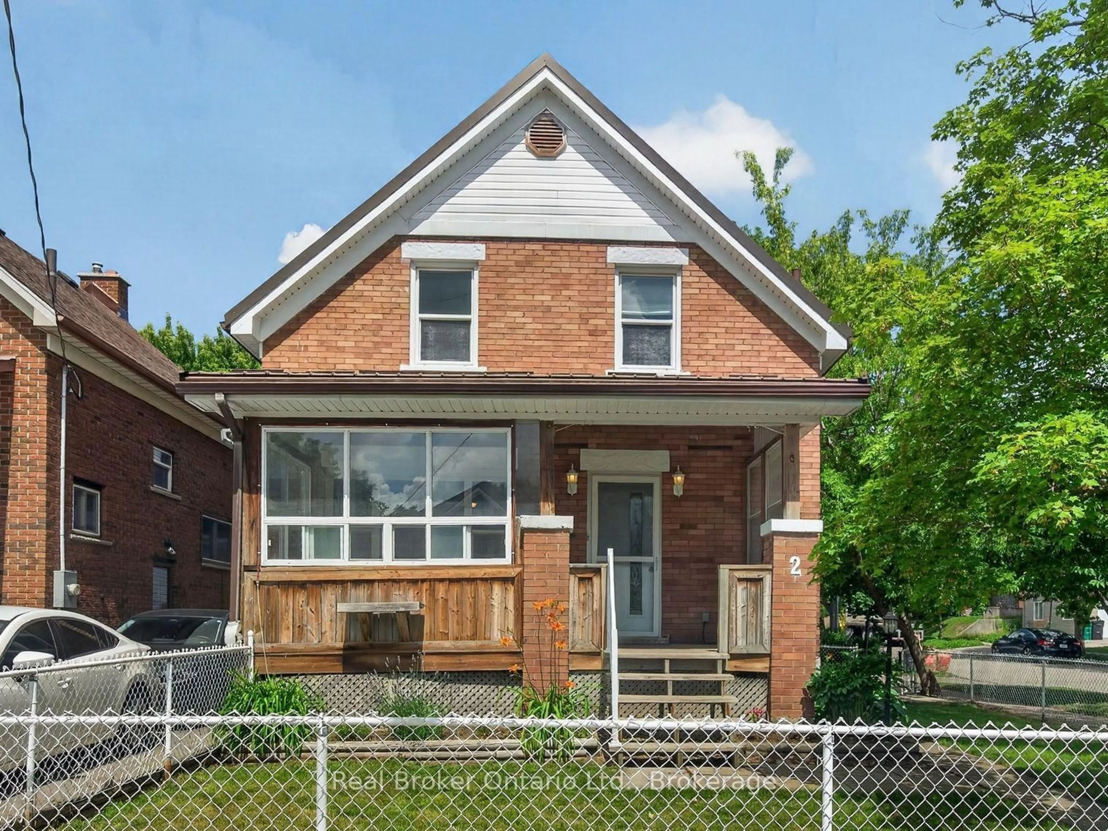 Home with brick exterior material, street for 2 Herlan Ave, Kitchener Ontario N2G 4K3