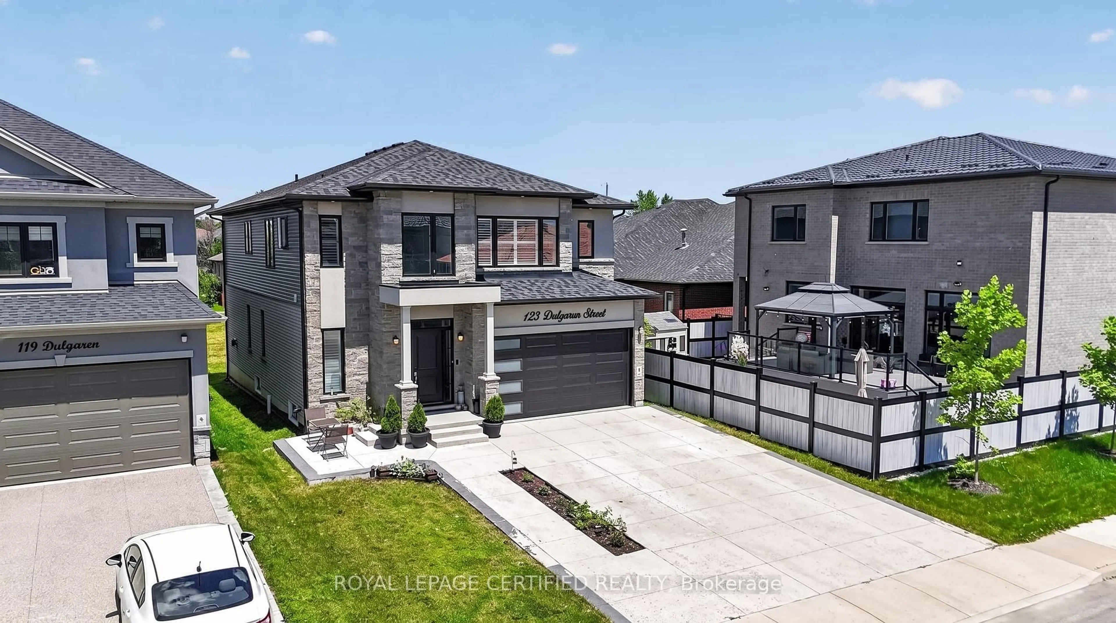 Home with brick exterior material, street for 123 Dulgaren St, Hamilton Ontario L8W 3J5