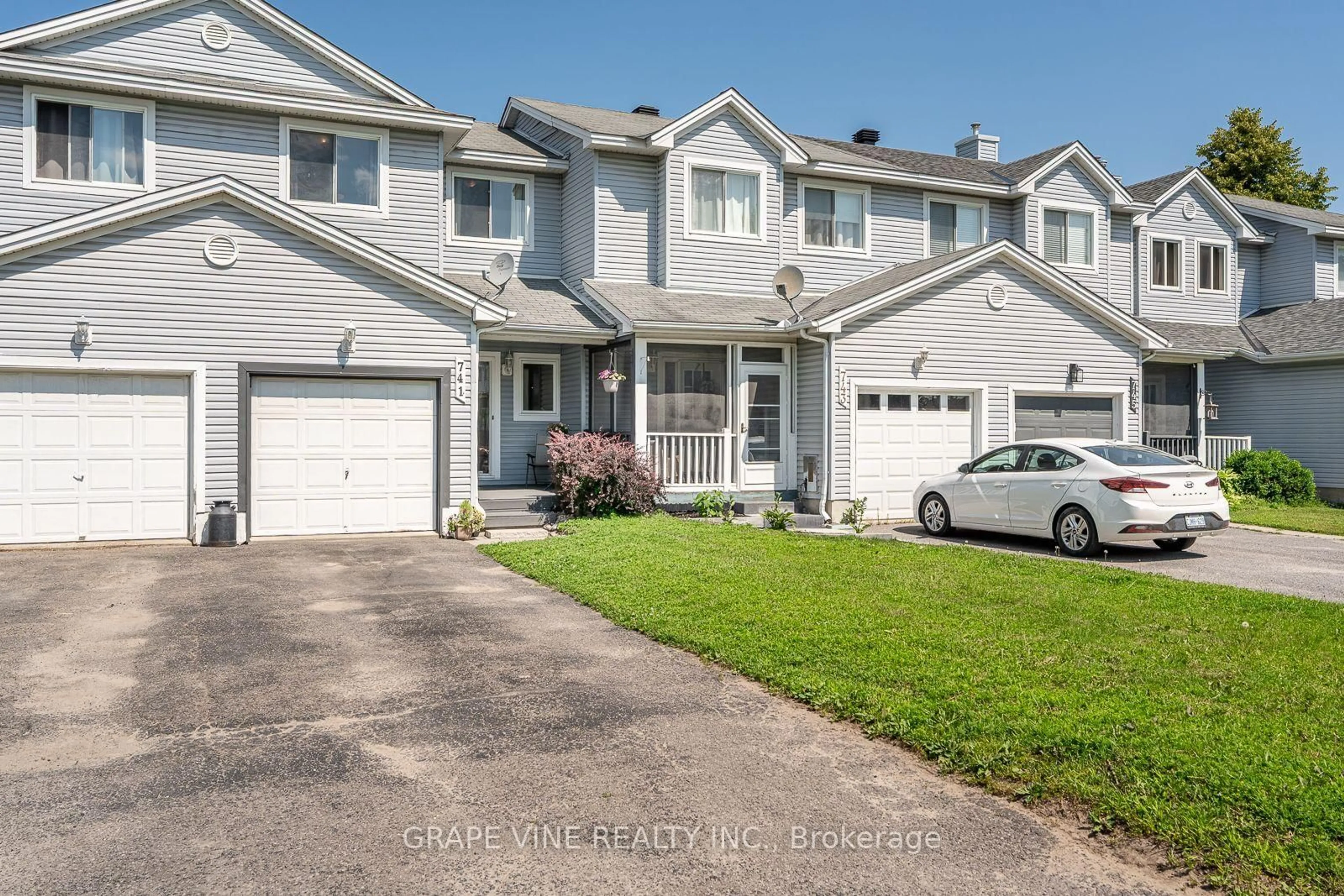 Home with vinyl exterior material, street for 741 Maley St, North Grenville Ontario K0G 1J0