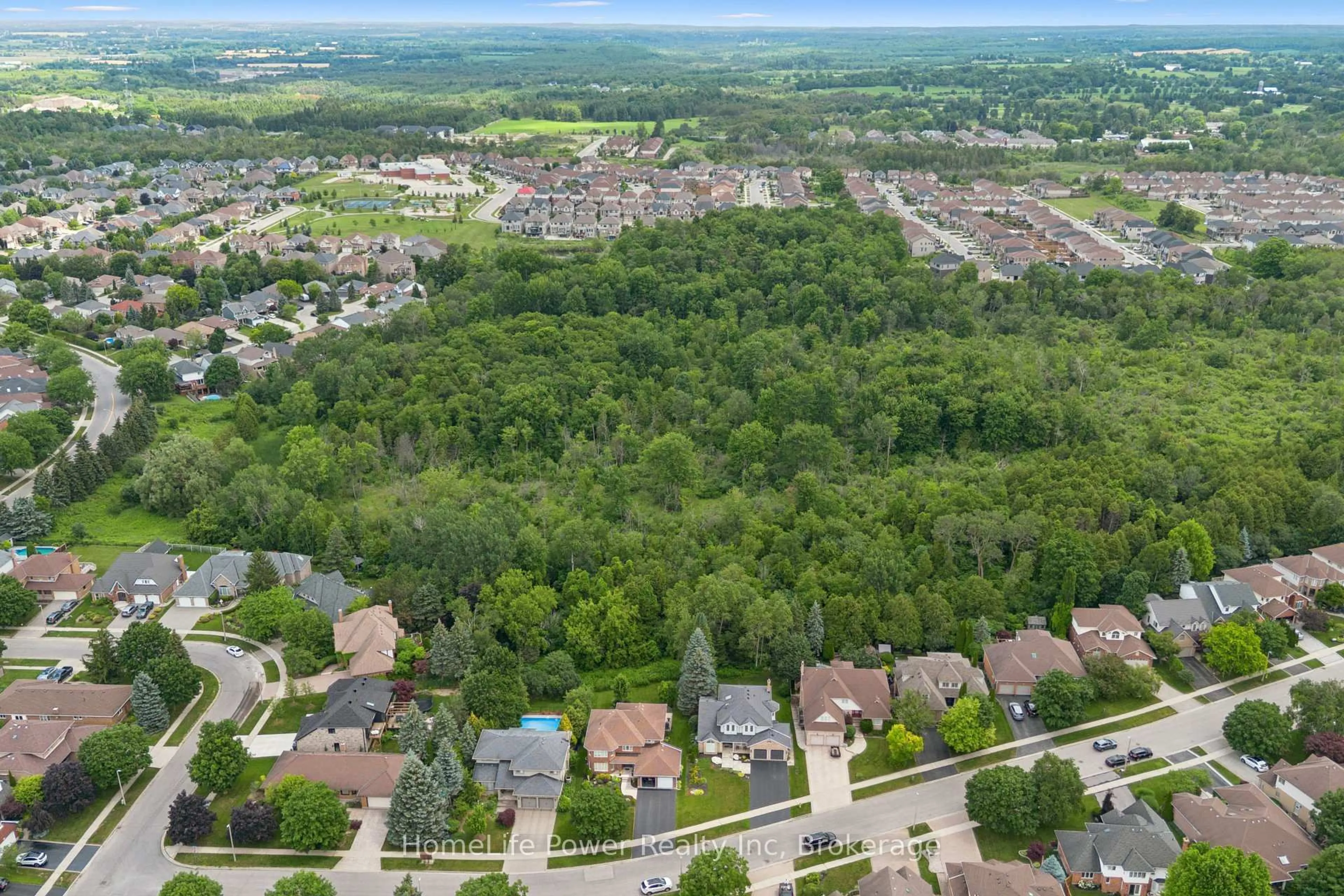 A pic from outside/outdoor area/front of a property/back of a property/a pic from drone, forest/trees view for 8 Robin Rd, Guelph Ontario N1L 1A7