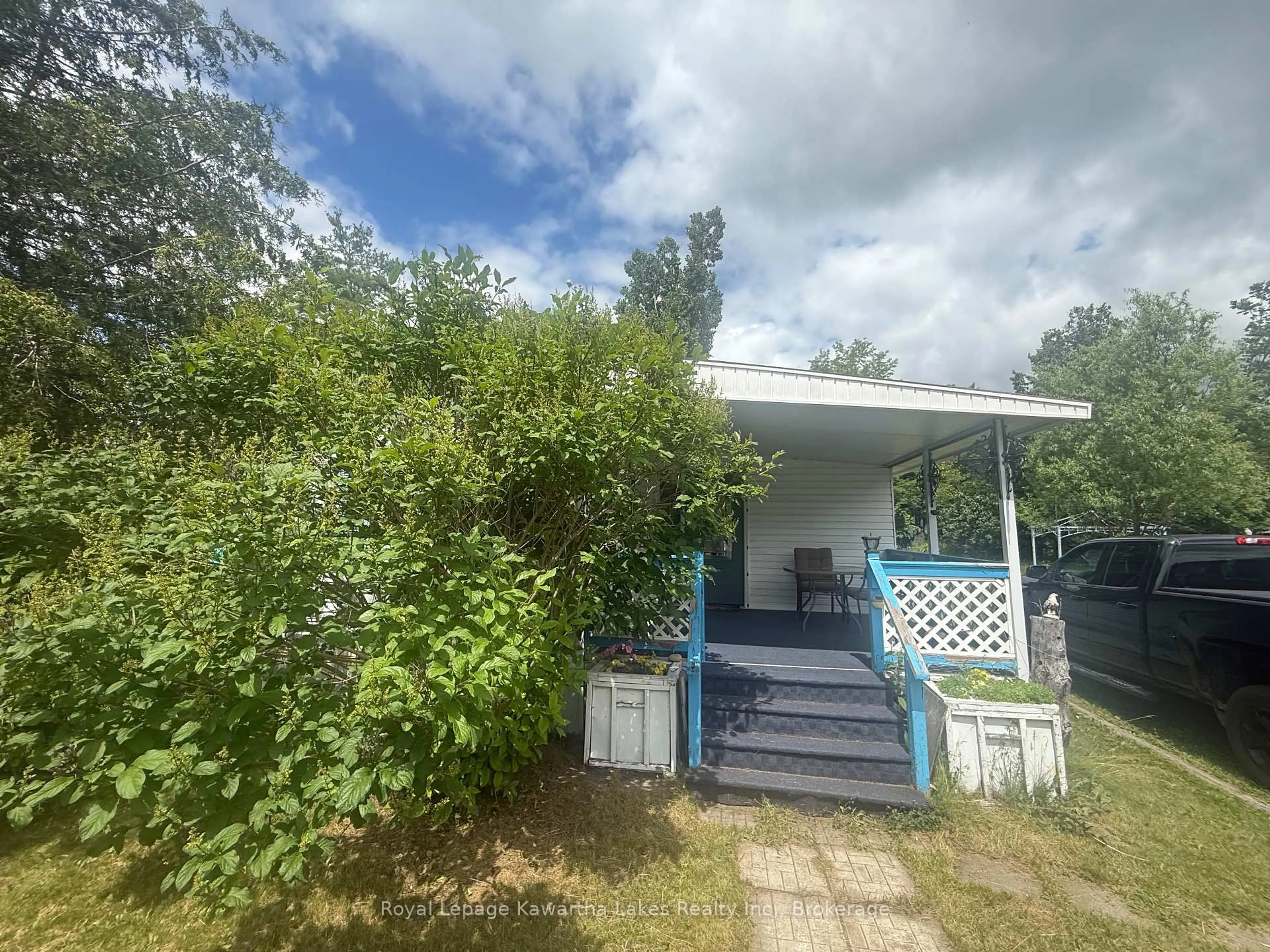 A pic from outside/outdoor area/front of a property/back of a property/a pic from drone, building for 1802 County Rd 121 Rd, Kawartha Lakes Ontario K0M 1N0