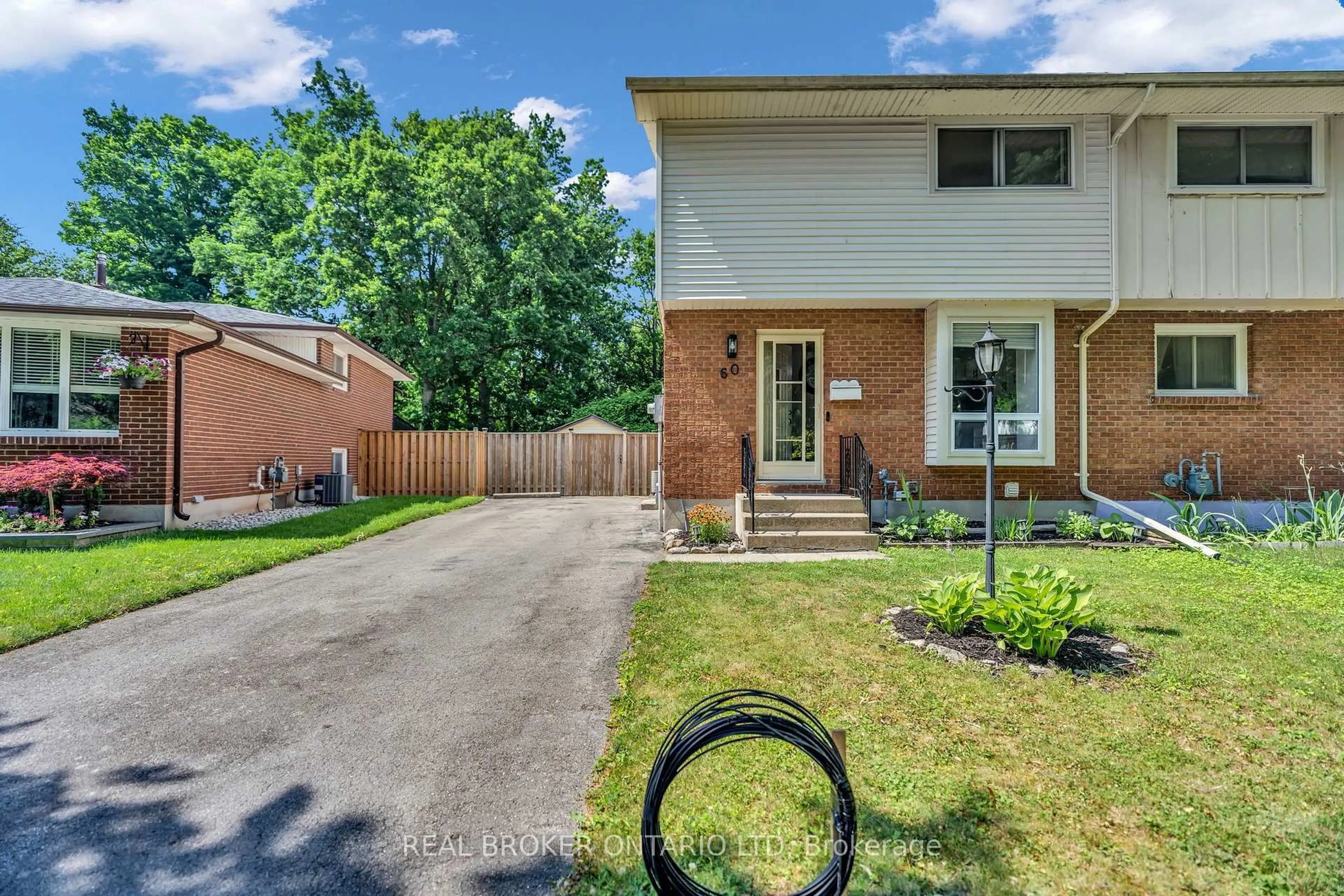 Home with brick exterior material, street for 60 Tilipe Rd, London East Ontario N5V 2X4