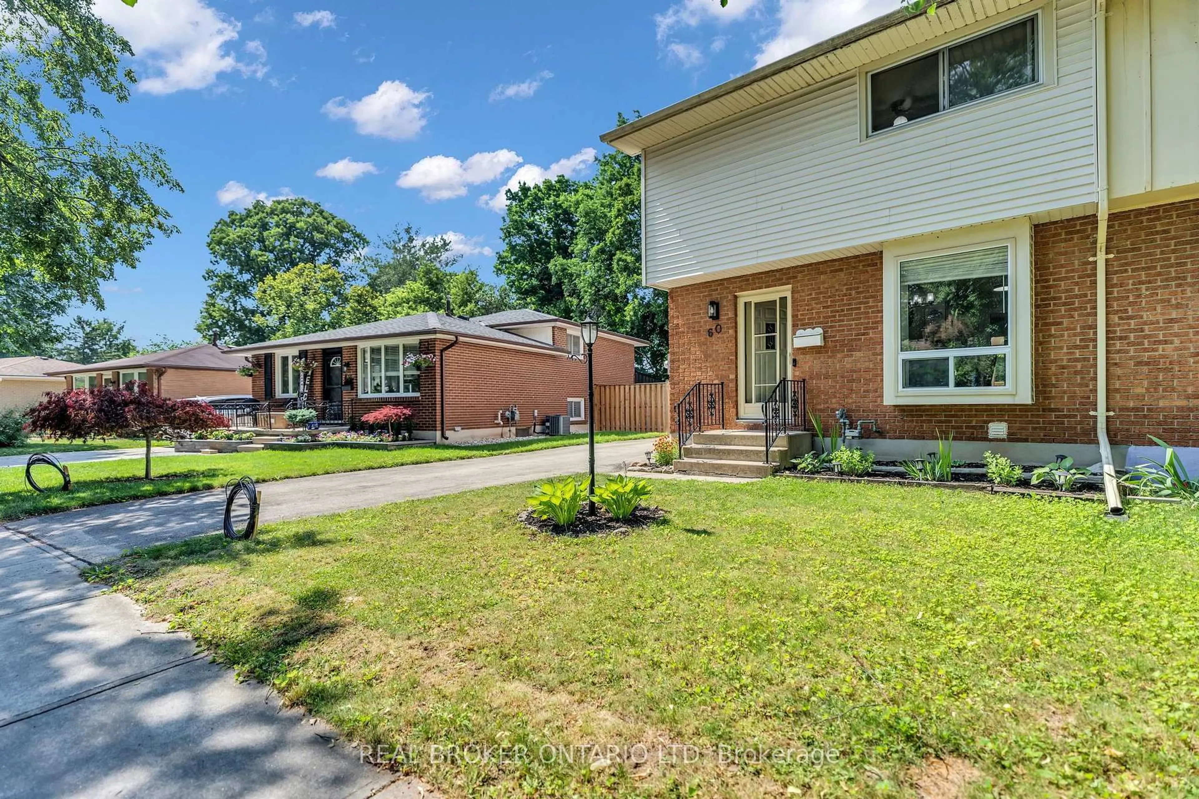 Home with brick exterior material, street for 60 Tilipe Rd, London East Ontario N5V 2X4