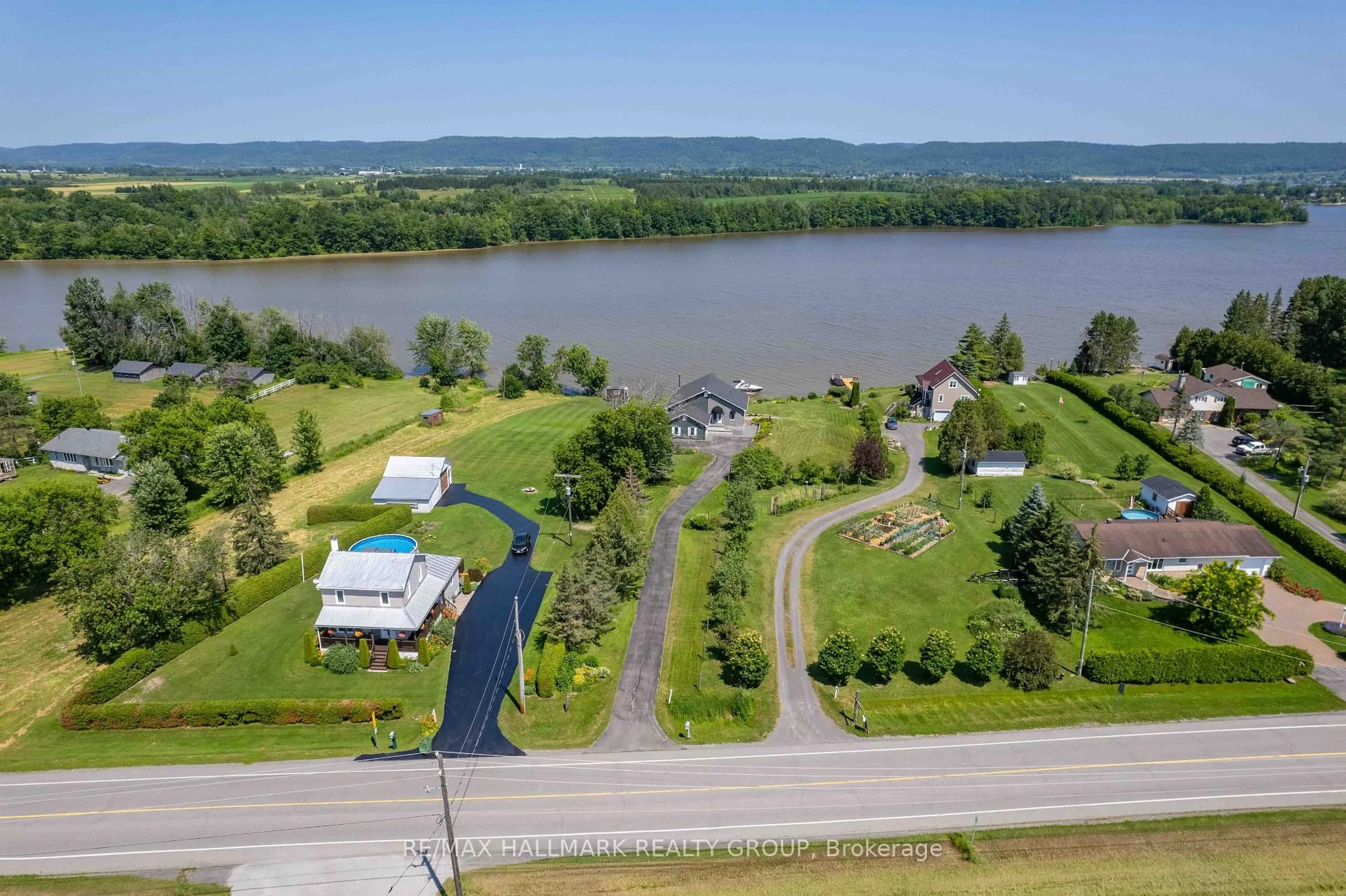 A pic from outside/outdoor area/front of a property/back of a property/a pic from drone, water/lake/river/ocean view for 3020 BAY Rd, Champlain Ontario K0B 1A0