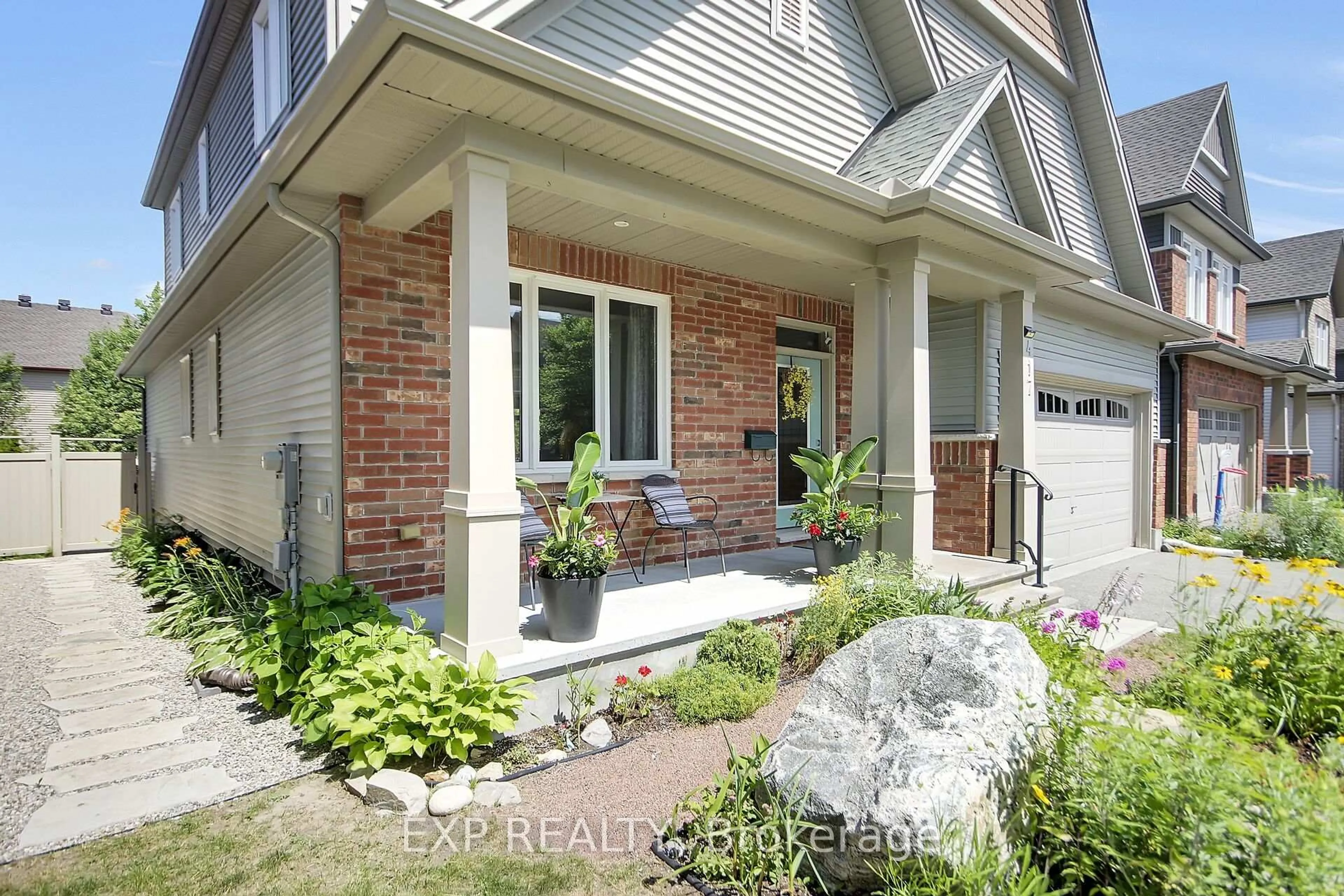 Home with brick exterior material, street for 417 Charing Cross Way, Ottawa Ontario K2J 5X9