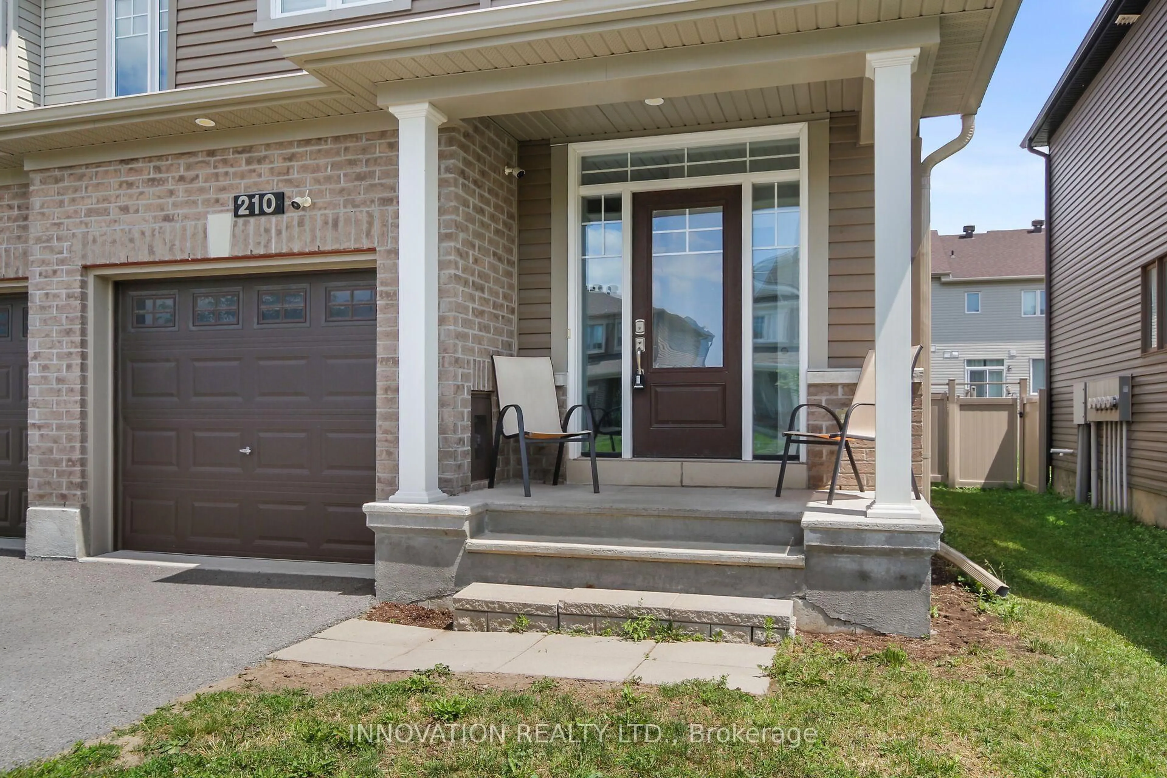 Home with brick exterior material, street for 210 Bandelier Way, Ottawa Ontario K2S 2J4