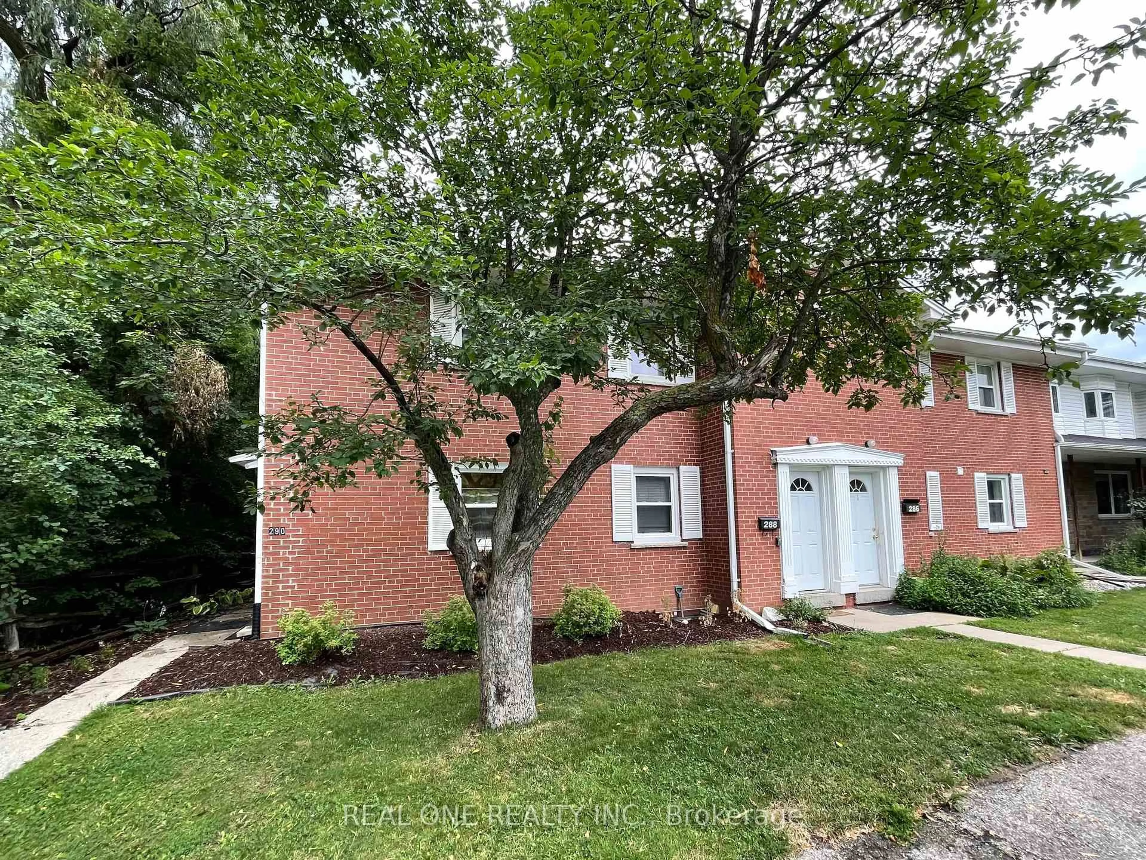 Home with brick exterior material, street for 290 WESTCOURT Pl, Waterloo Ontario N2L 2R7