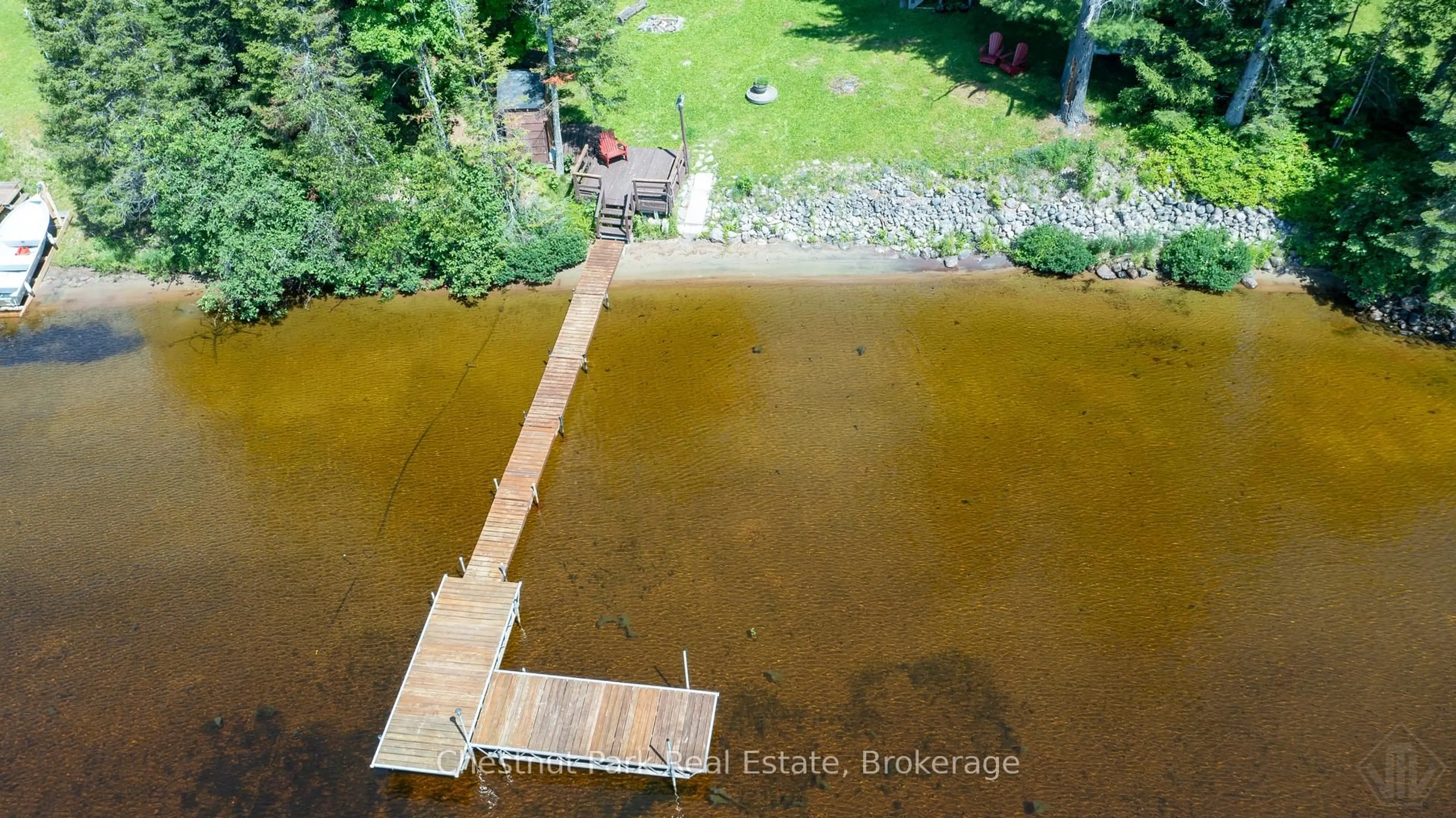 A pic from outside/outdoor area/front of a property/back of a property/a pic from drone, water/lake/river/ocean view for 254 Chapman Dr, Magnetawan Ontario P0A 1P0