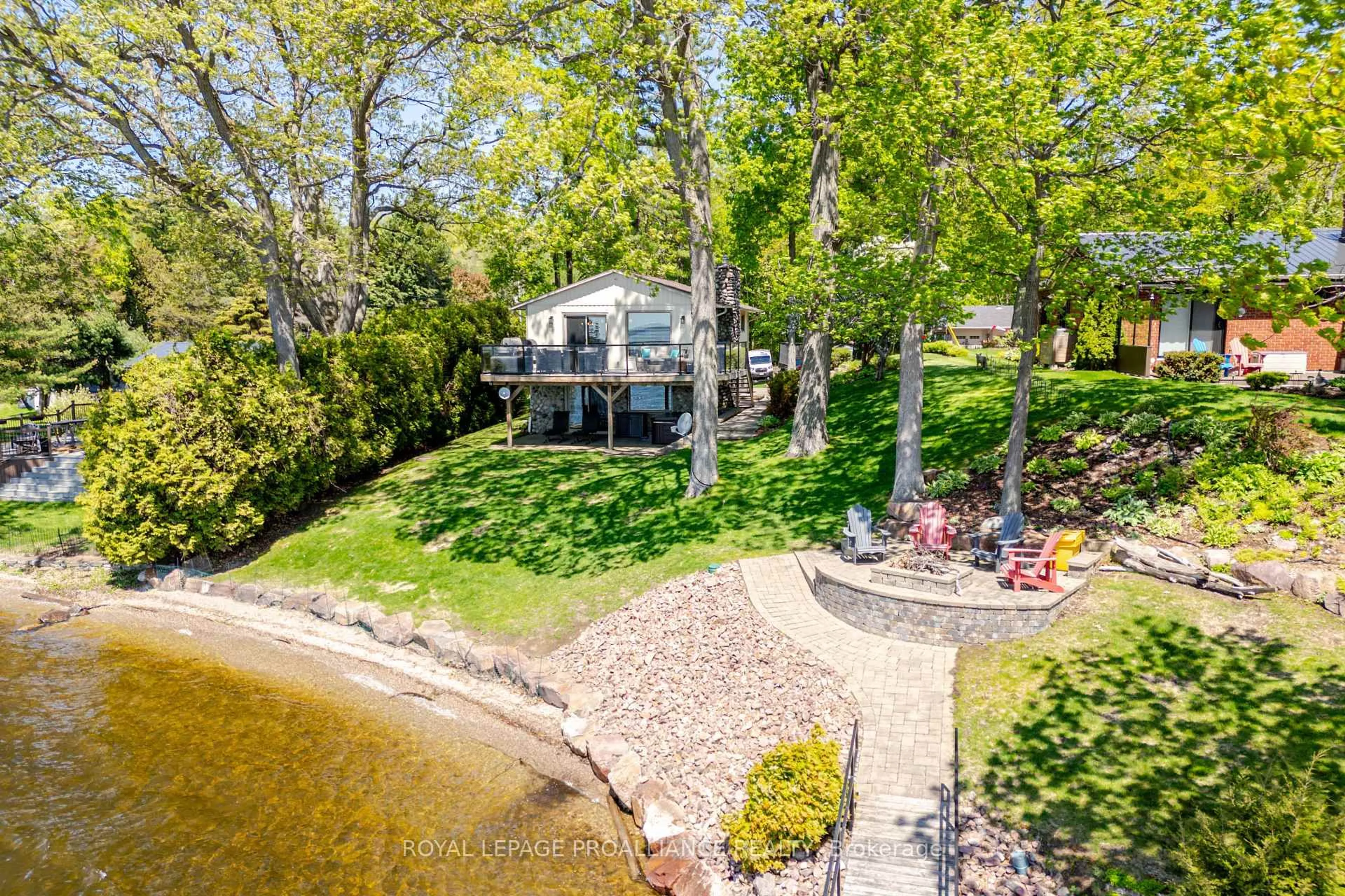 A pic from outside/outdoor area/front of a property/back of a property/a pic from drone, water/lake/river/ocean view for 23 Moon Rd, Front of Yonge Ontario K0E 1R0
