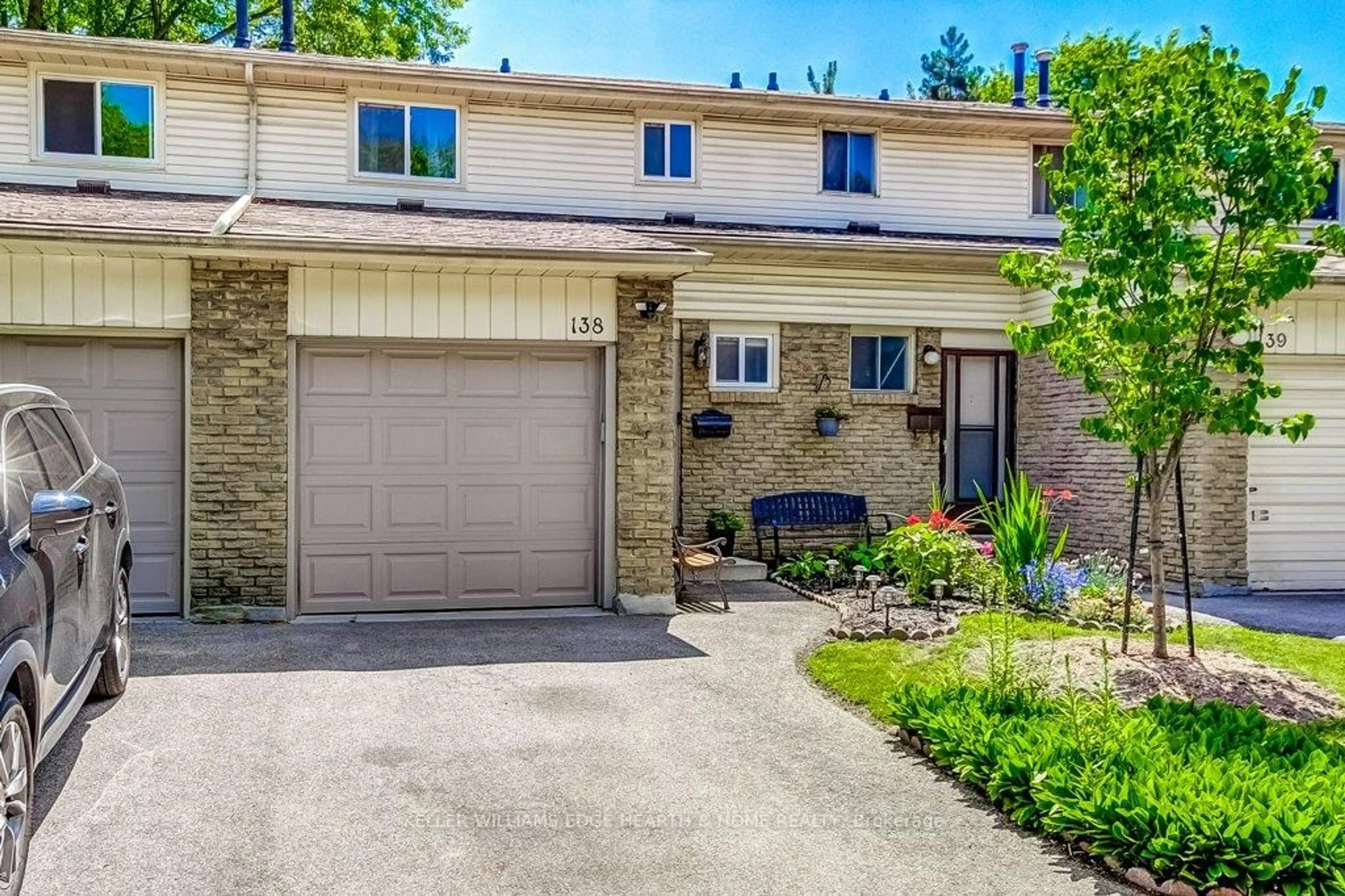 Home with brick exterior material, street for 100 Quigley Rd #138, Hamilton Ontario L8K 6J1