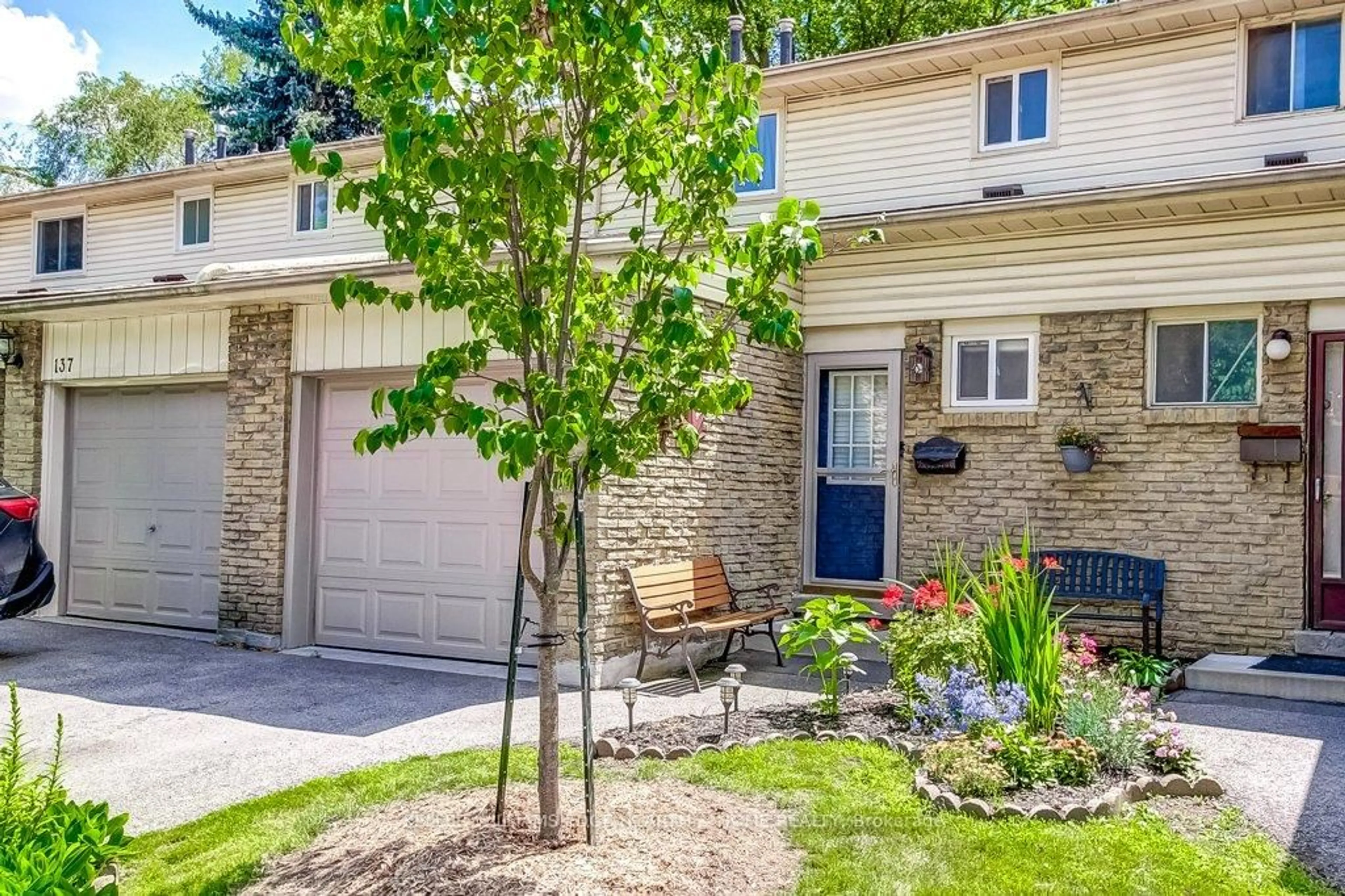 Home with brick exterior material, street for 100 Quigley Rd #138, Hamilton Ontario L8K 6J1