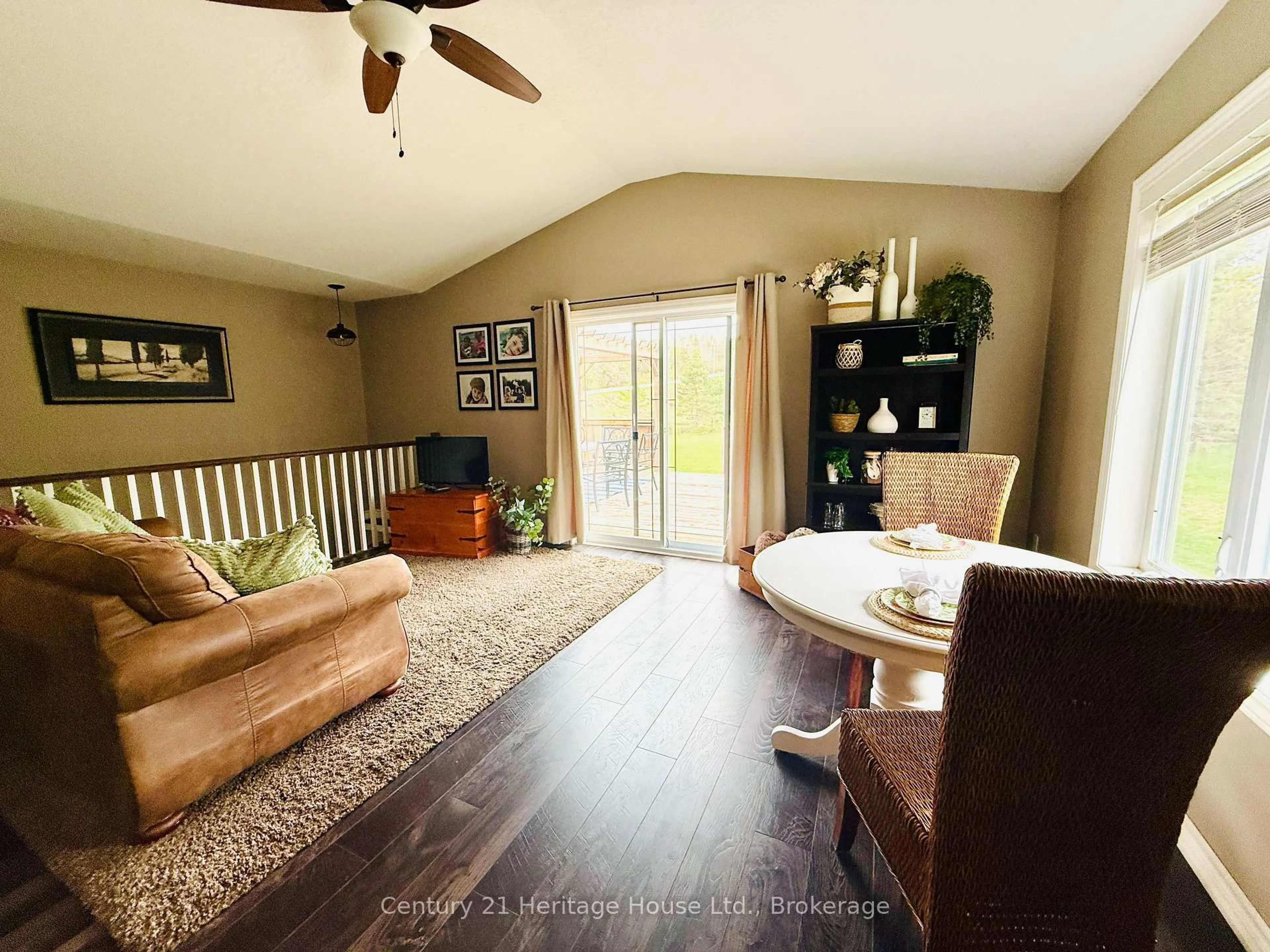 Living room with furniture, wood/laminate floor for 201 Hutton Hill Rd, West Grey Ontario N0G 1R0