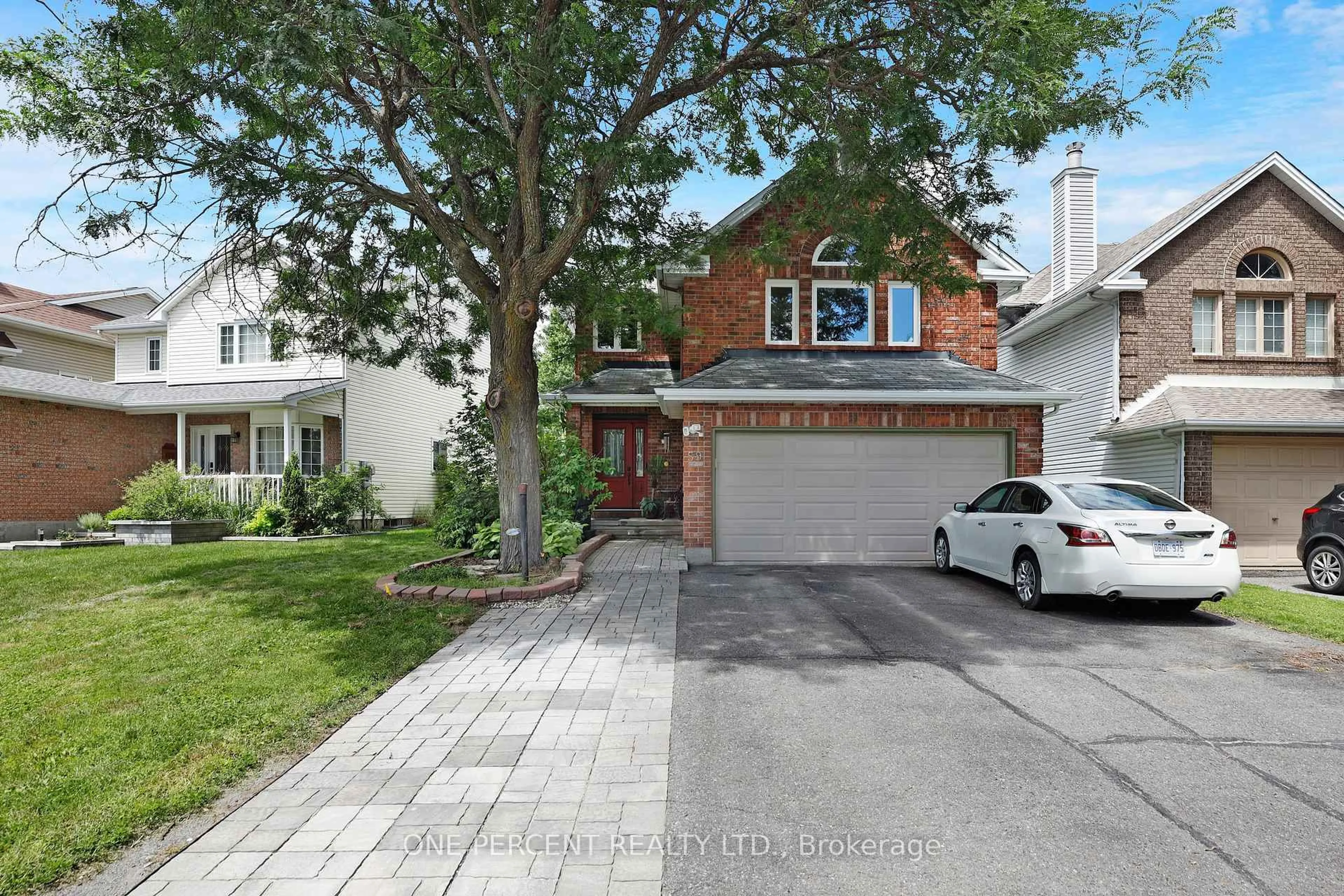 Home with brick exterior material, street for 59 Woodford Way, Nepean Ontario K2J 4B5