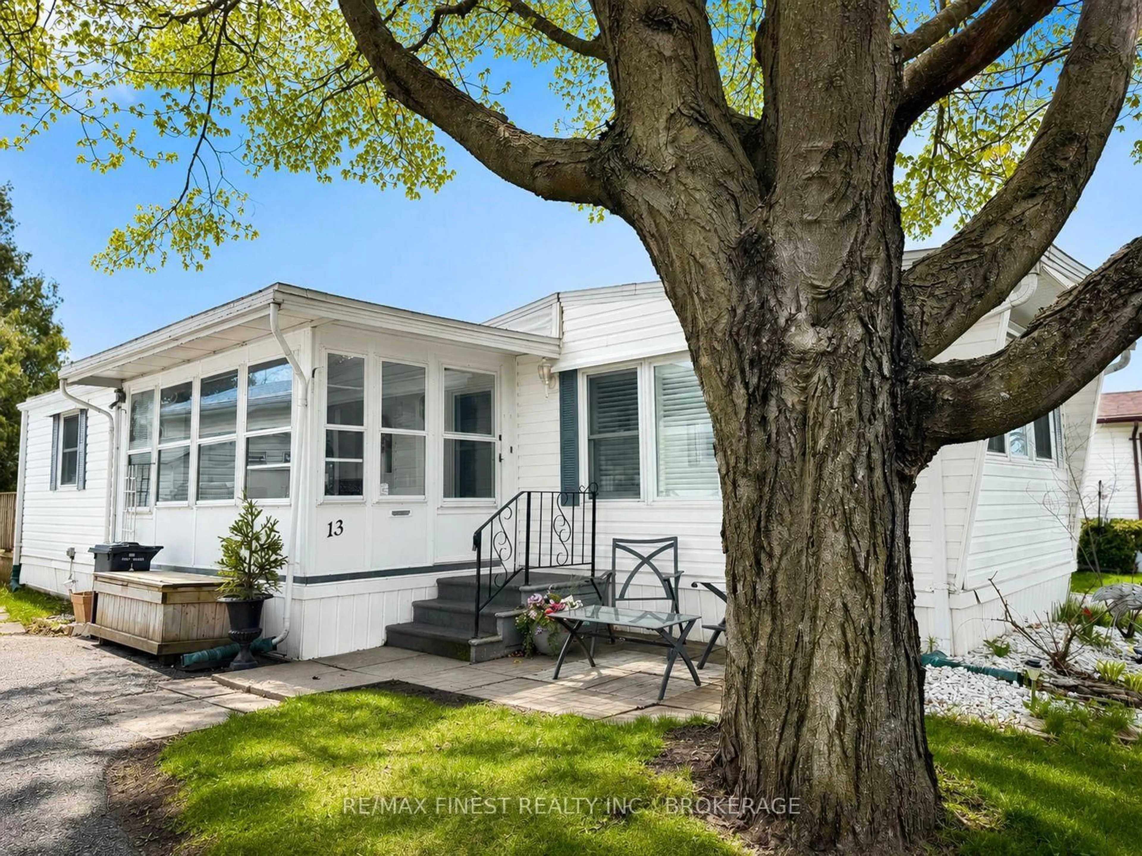 Home with vinyl exterior material, street for 13 Wentworth Dr, Kingston Ontario K7K 5E1