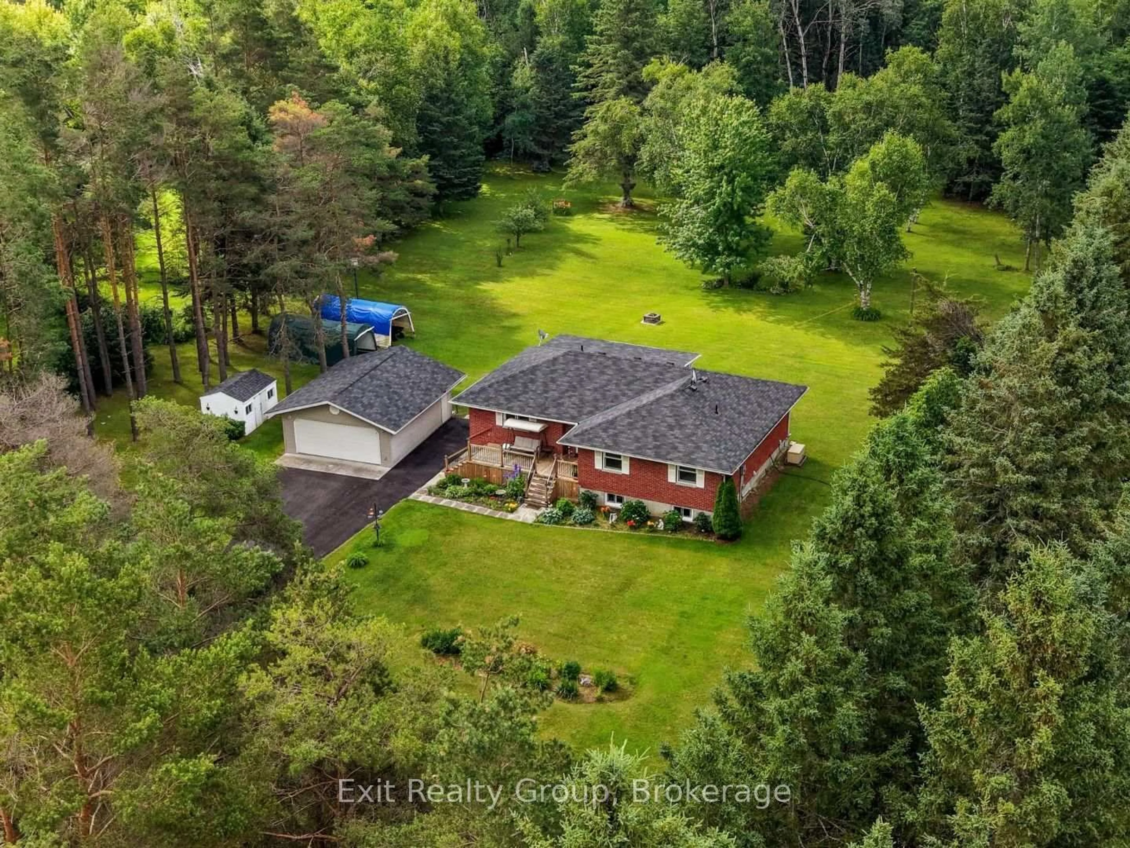 A pic from outside/outdoor area/front of a property/back of a property/a pic from drone, forest/trees view for 31 Birchwood Crt, Trent Hills Ontario K0L 1Y0