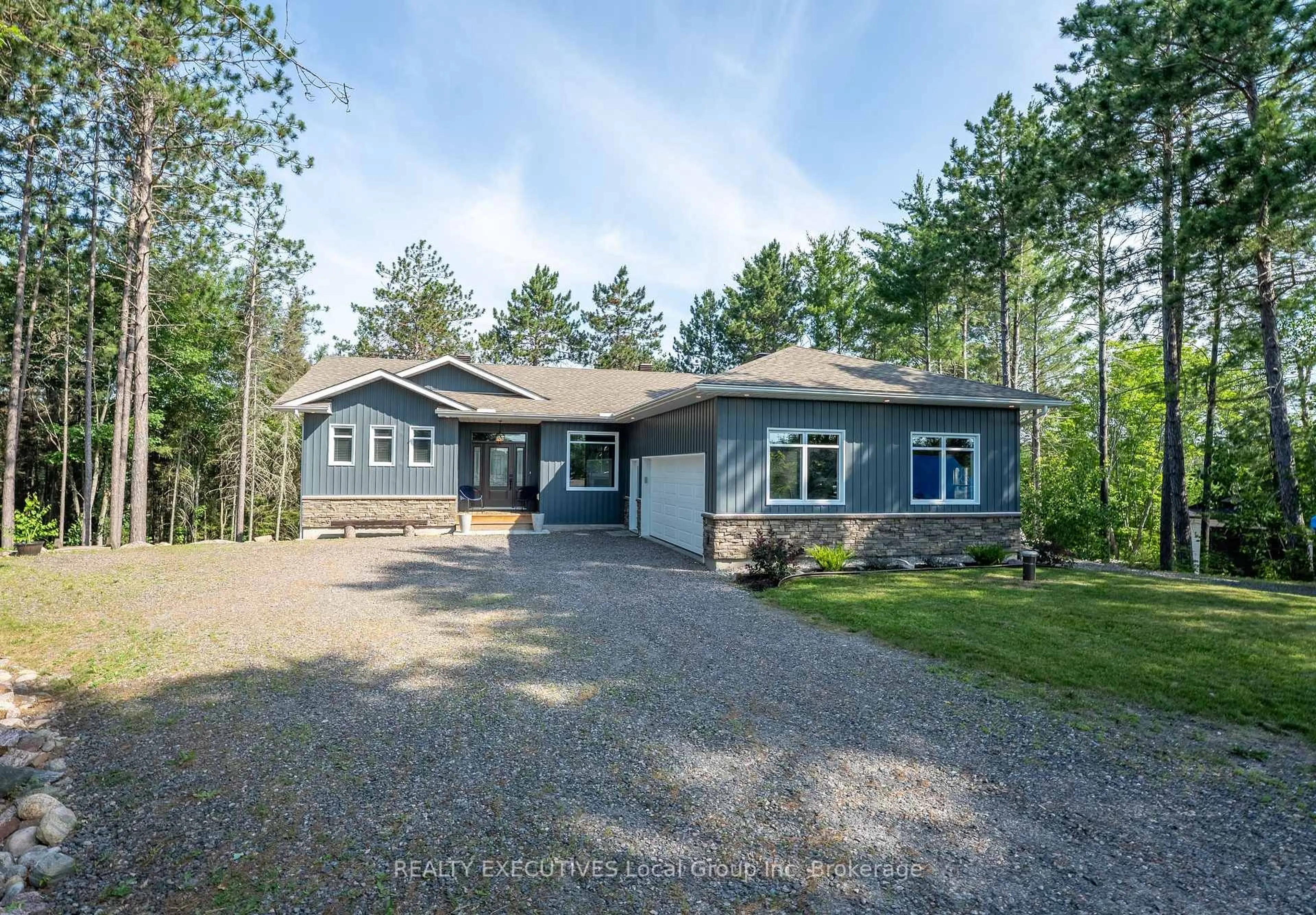 A pic from outside/outdoor area/front of a property/back of a property/a pic from drone, unknown for 87 Oakridge Dr, East Ferris Ontario P0H 1K0