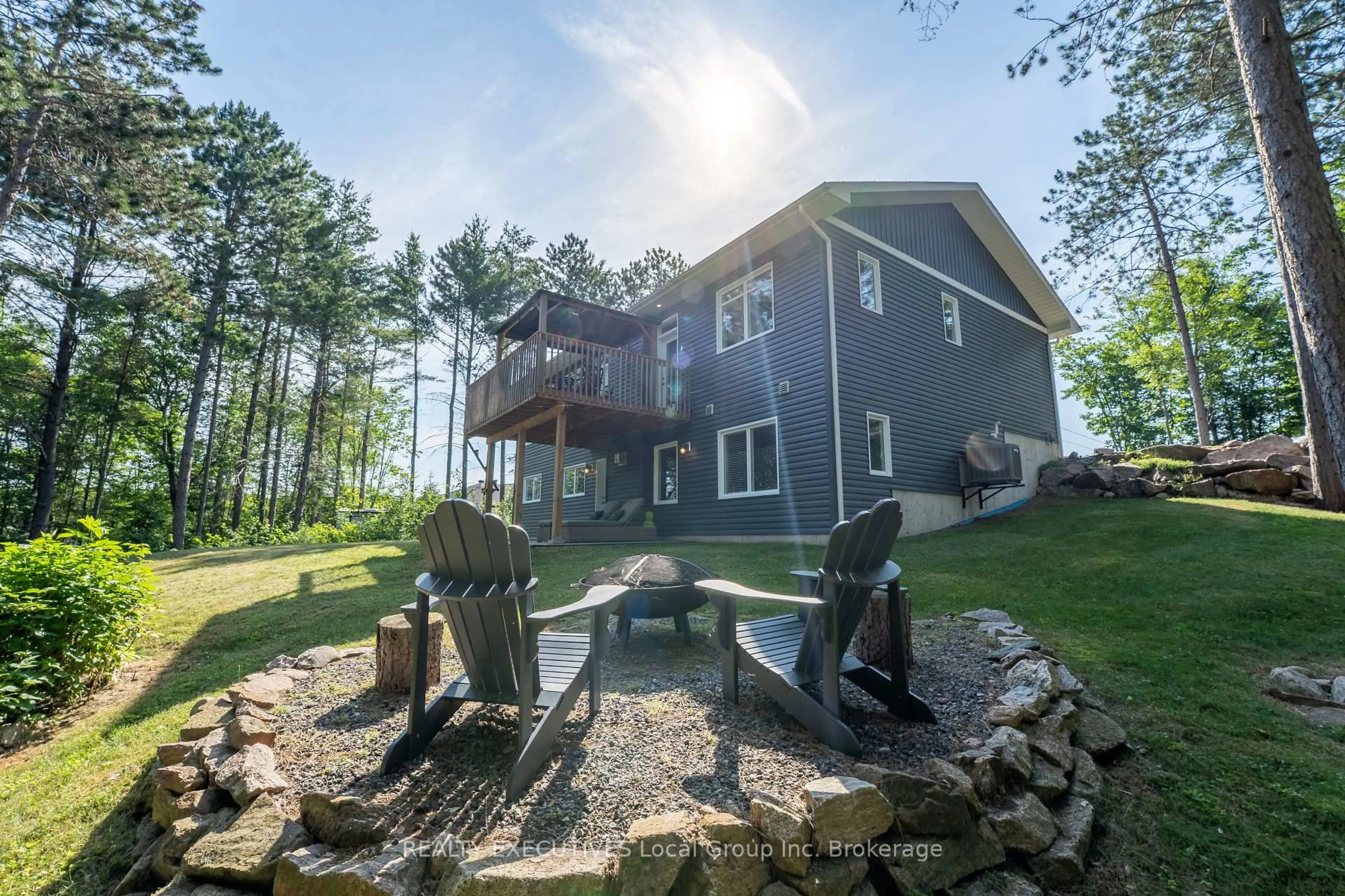 A pic from outside/outdoor area/front of a property/back of a property/a pic from drone, water/lake/river/ocean view for 87 Oakridge Dr, East Ferris Ontario P0H 1K0