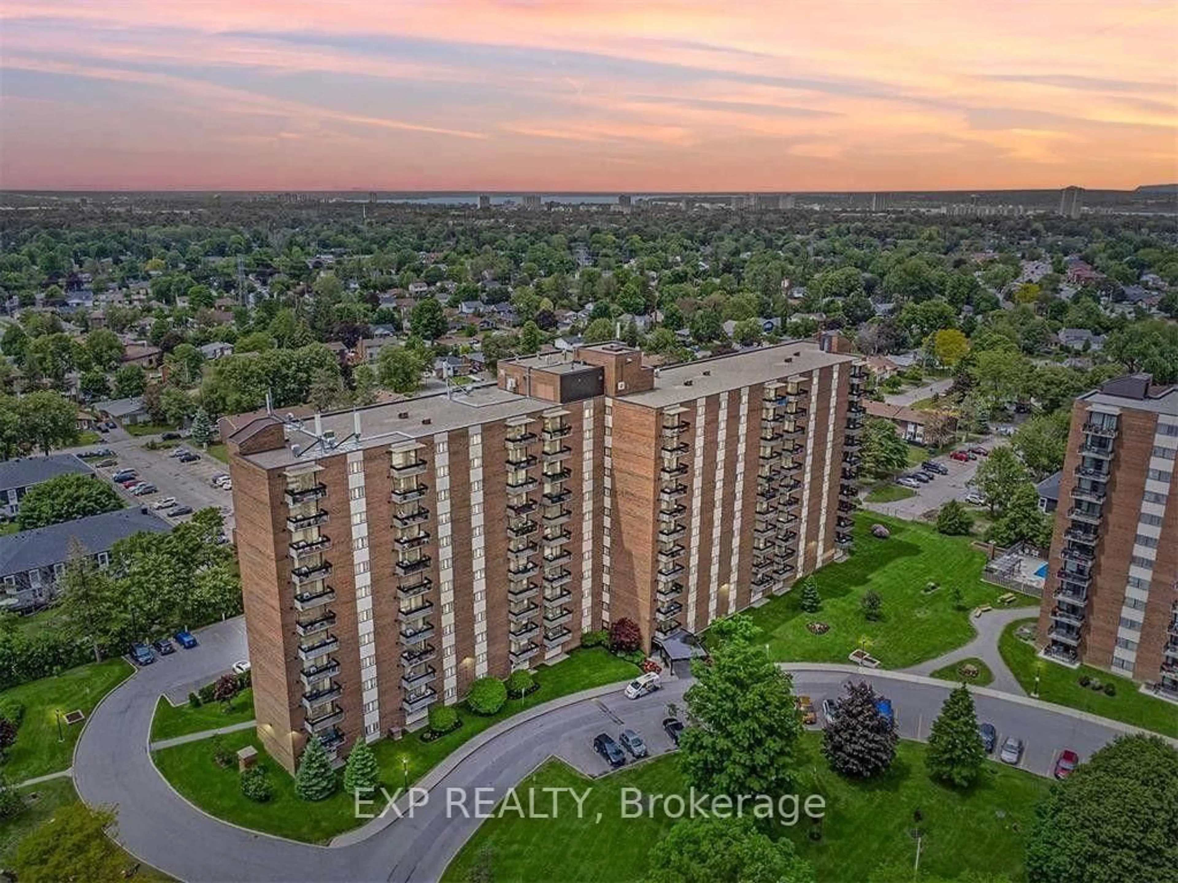 A pic from outside/outdoor area/front of a property/back of a property/a pic from drone, city buildings view from balcony for 1505 Baseline Rd #103, Ottawa Ontario K2C 3L4