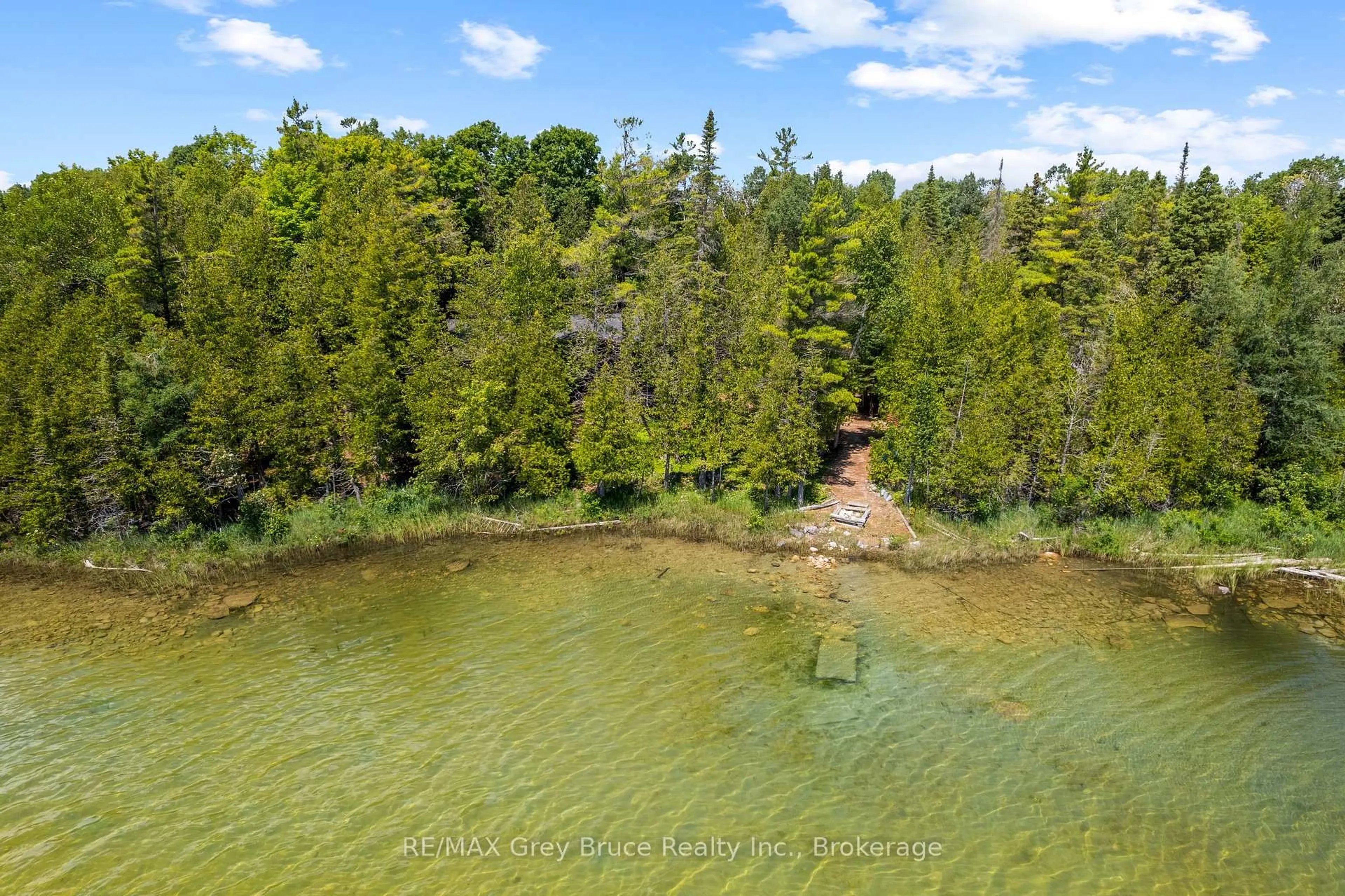 A pic from outside/outdoor area/front of a property/back of a property/a pic from drone, water/lake/river/ocean view for 29 Hope Dr, Northern Bruce Peninsula Ontario N0H 1Z0
