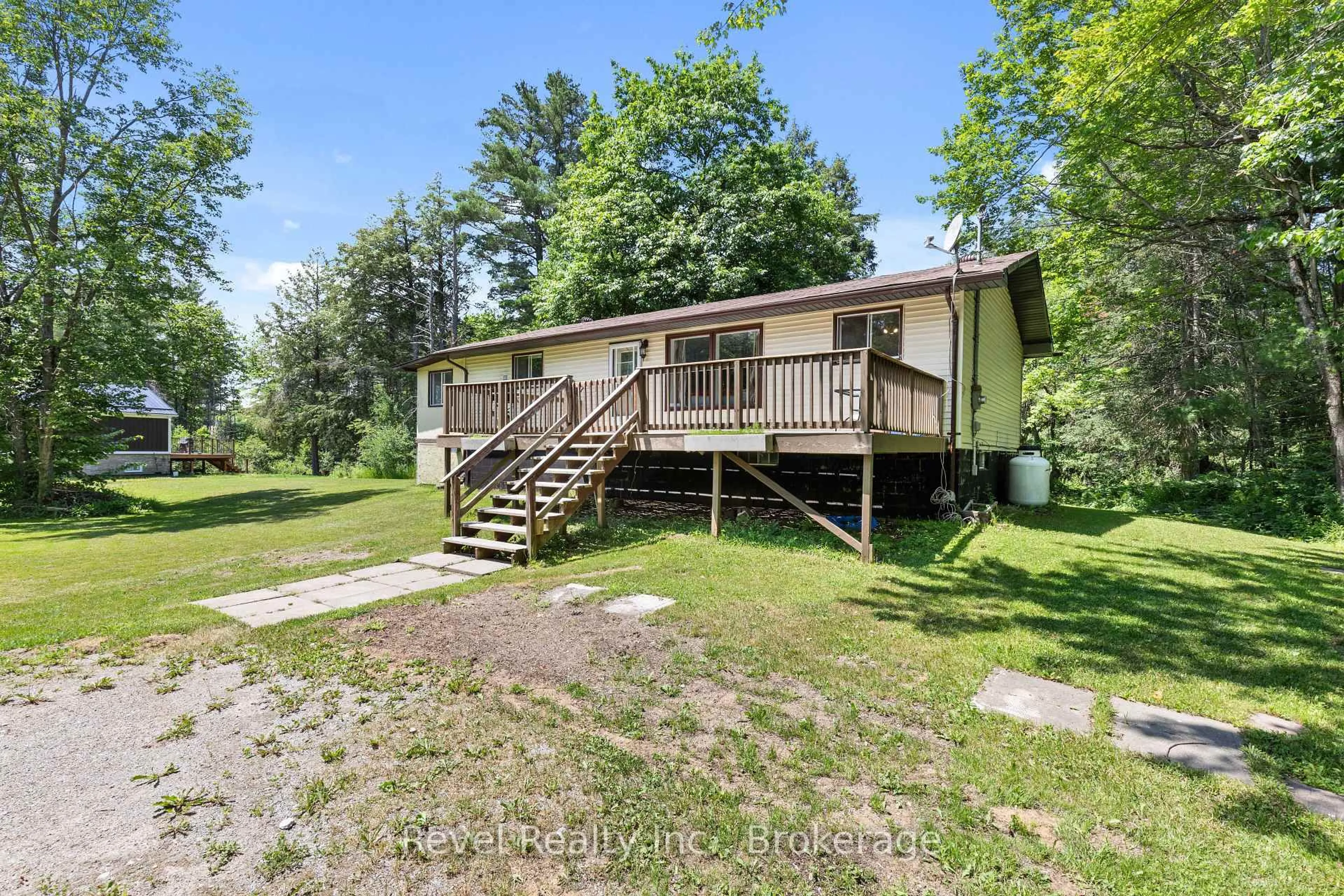 A pic from outside/outdoor area/front of a property/back of a property/a pic from drone, water/lake/river/ocean view for 31 Morrison St, Kawartha Lakes Ontario K0M 2L0