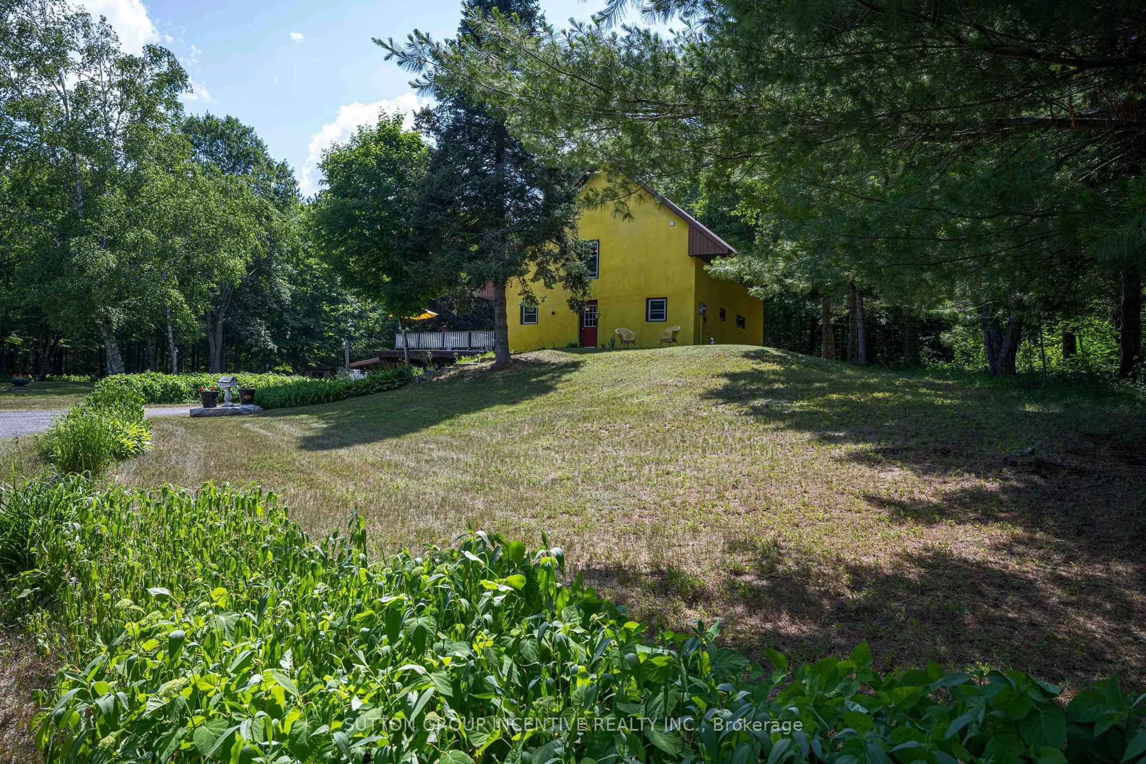 A pic from outside/outdoor area/front of a property/back of a property/a pic from drone, street for 1093 Kushog Lake Rd, Minden Hills Ontario K0M 2K0