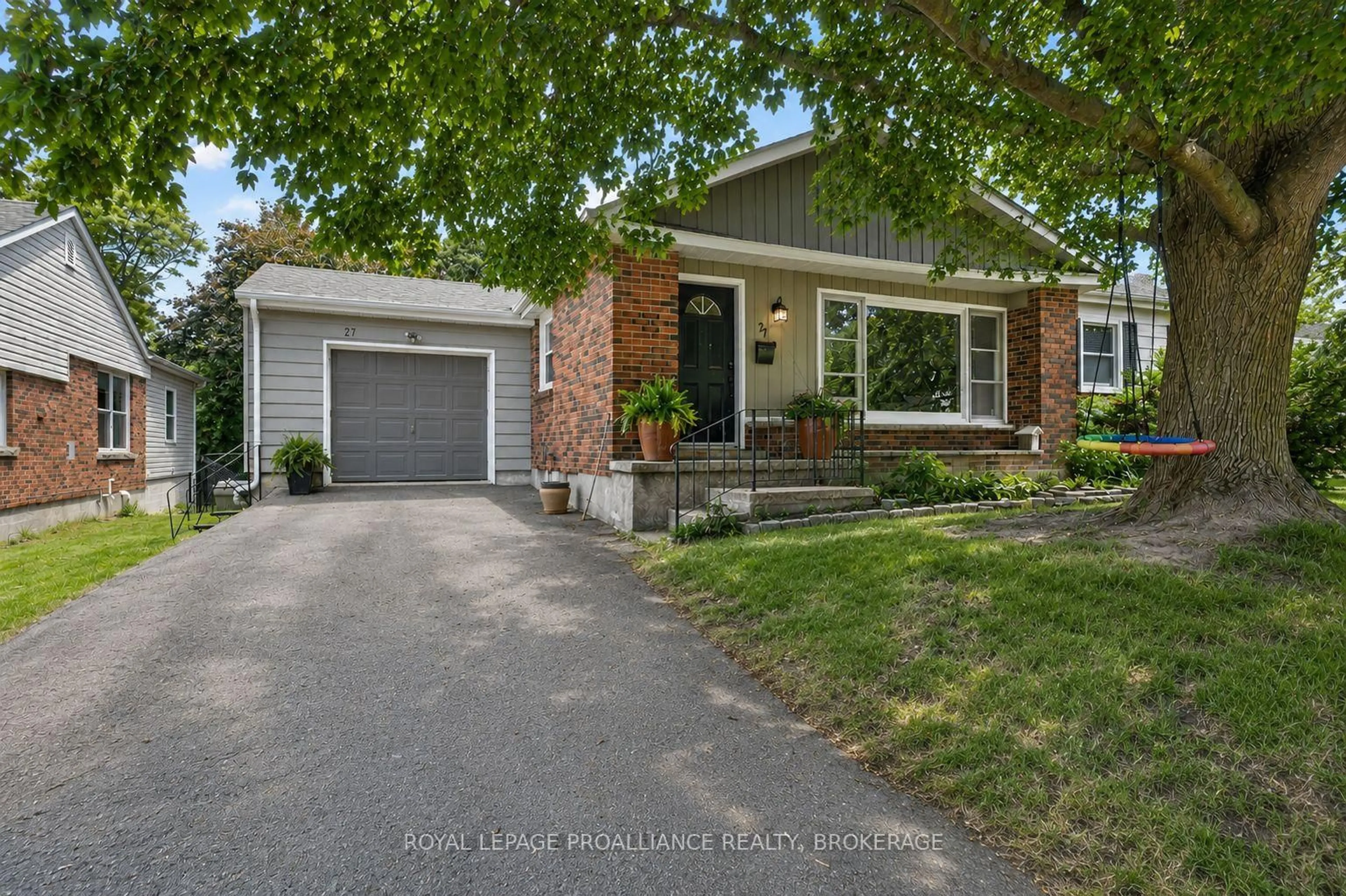 Home with brick exterior material, street for 27 Elizabeth Ave, Kingston Ontario K7M 3G9