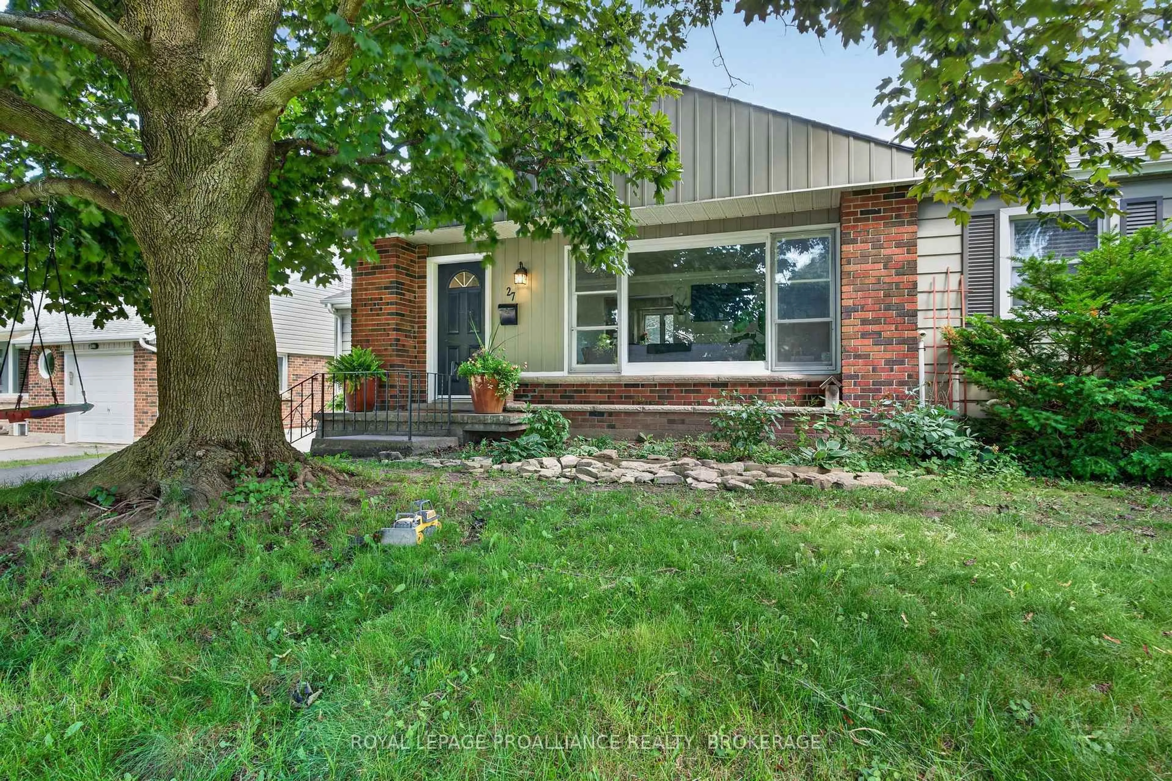 Home with brick exterior material, street for 27 Elizabeth Ave, Kingston Ontario K7M 3G9