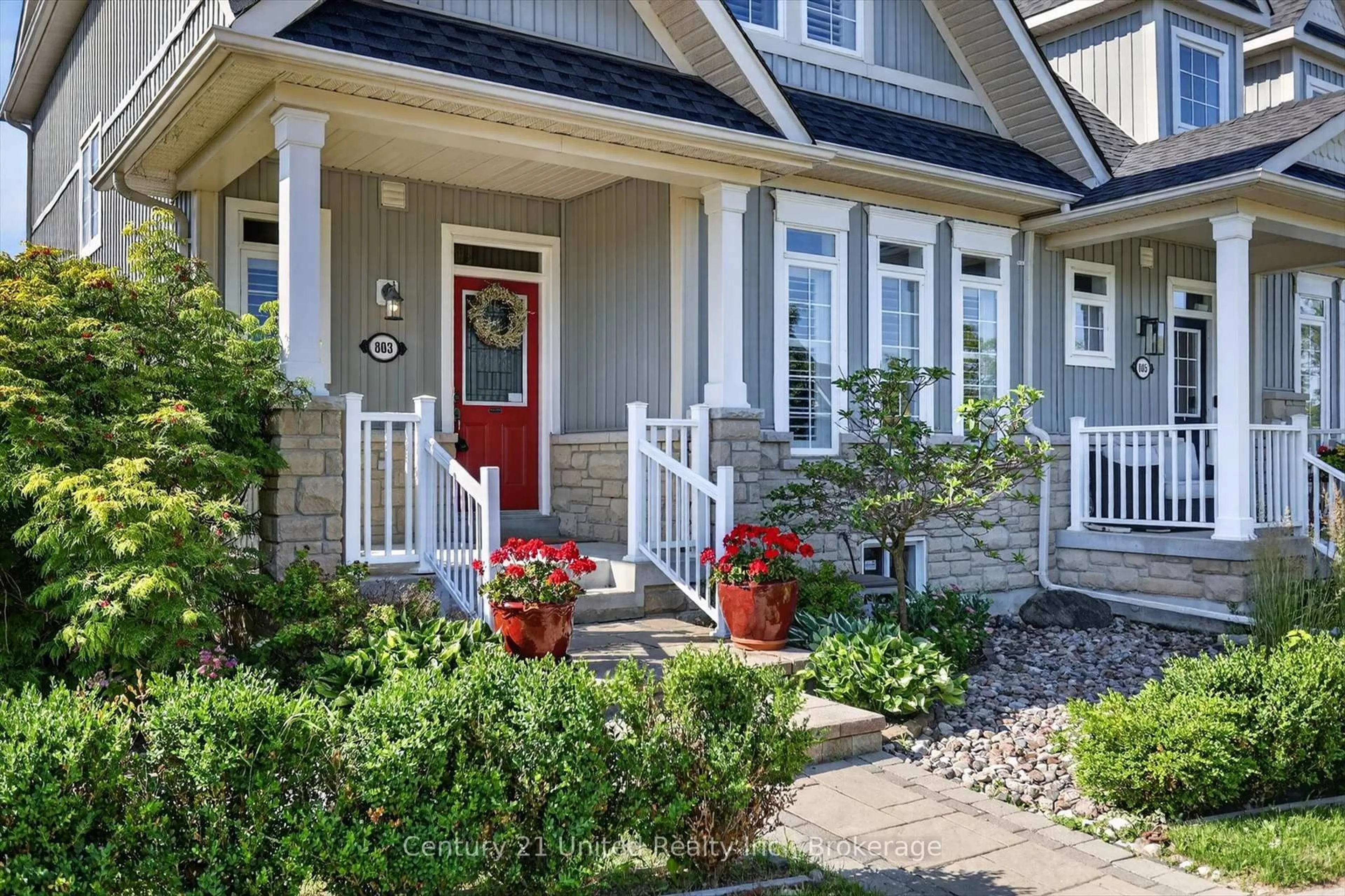 Home with vinyl exterior material, street for 803 Charles Wilson Pkwy, Cobourg Ontario K9A 0E2