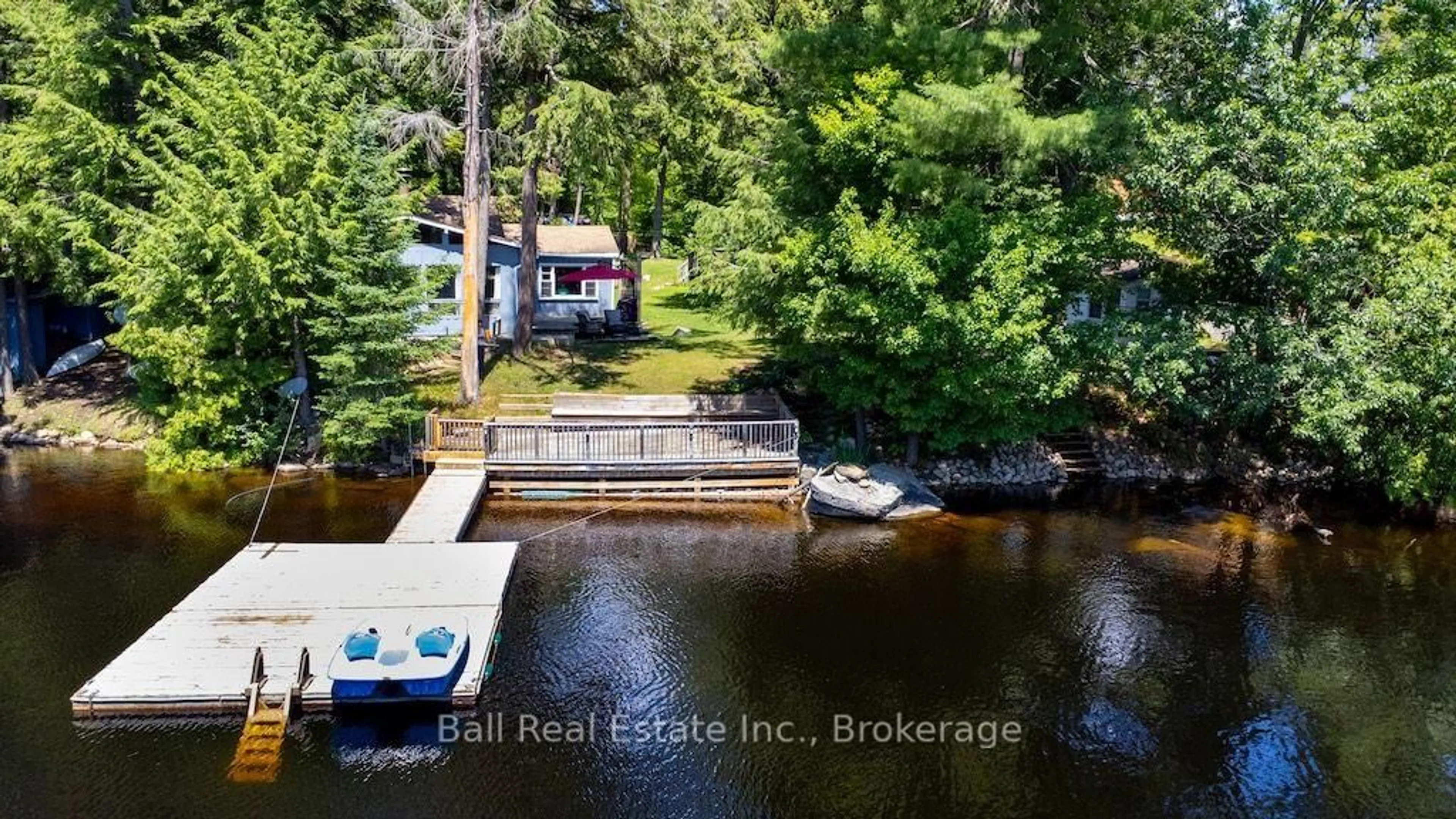 A pic from outside/outdoor area/front of a property/back of a property/a pic from drone, water/lake/river/ocean view for 142 Baldwin Bay Rd, Trent Lakes Ontario K0L 1J0