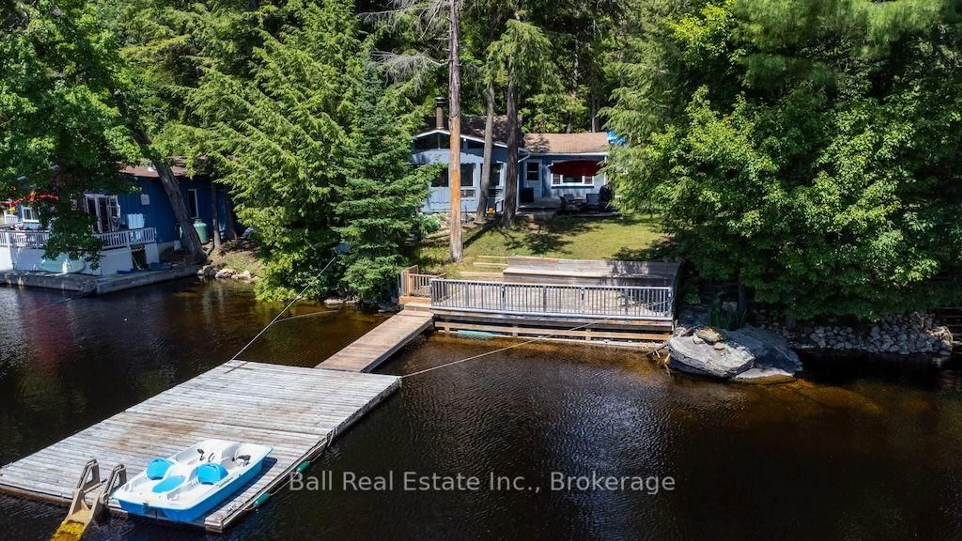 A pic from outside/outdoor area/front of a property/back of a property/a pic from drone, water/lake/river/ocean view for 142 Baldwin Bay Rd, Trent Lakes Ontario K0L 1J0