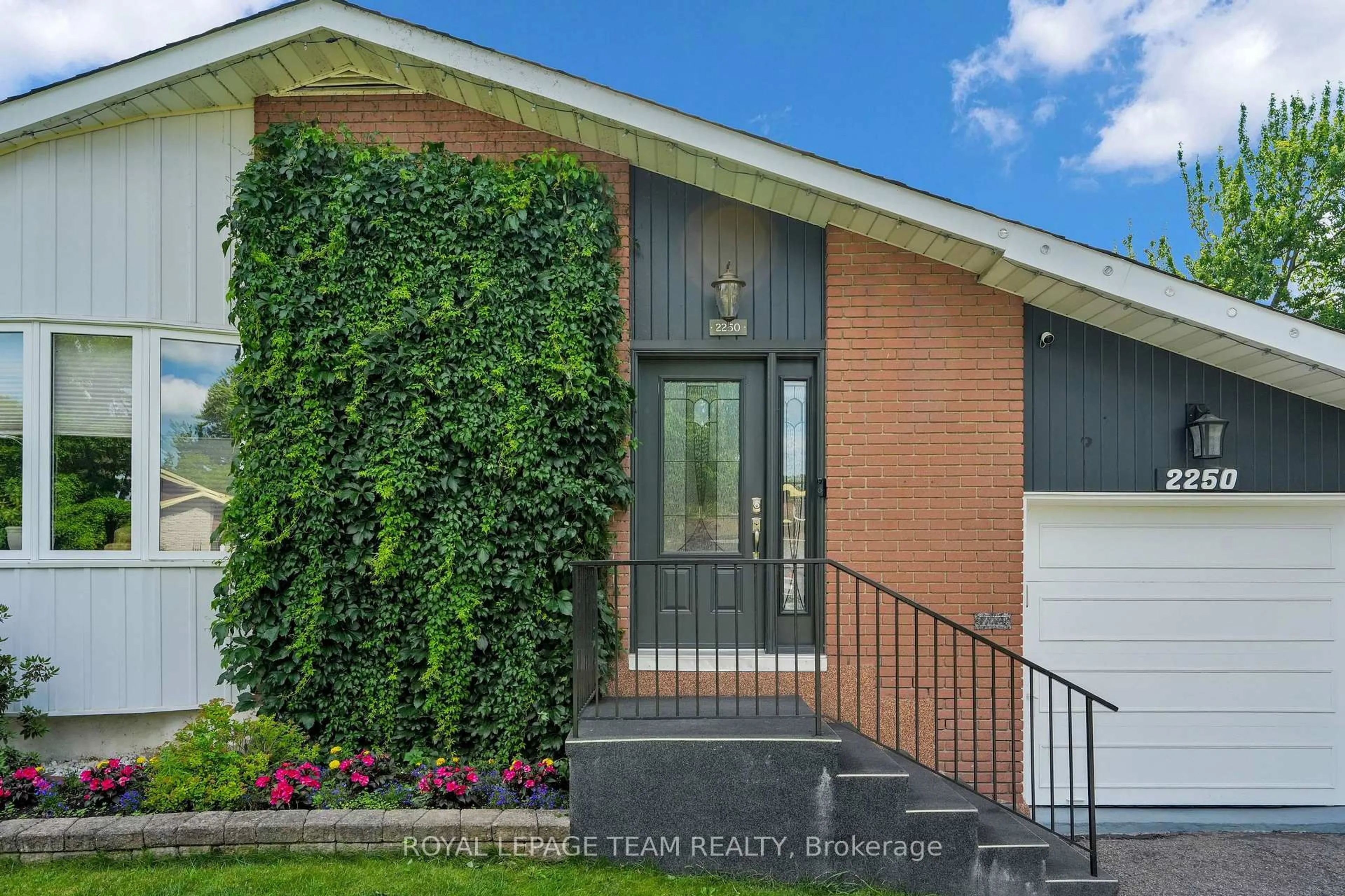 Home with brick exterior material, street for 2250 Urbandale Dr, Ottawa Ontario K1G 3G6
