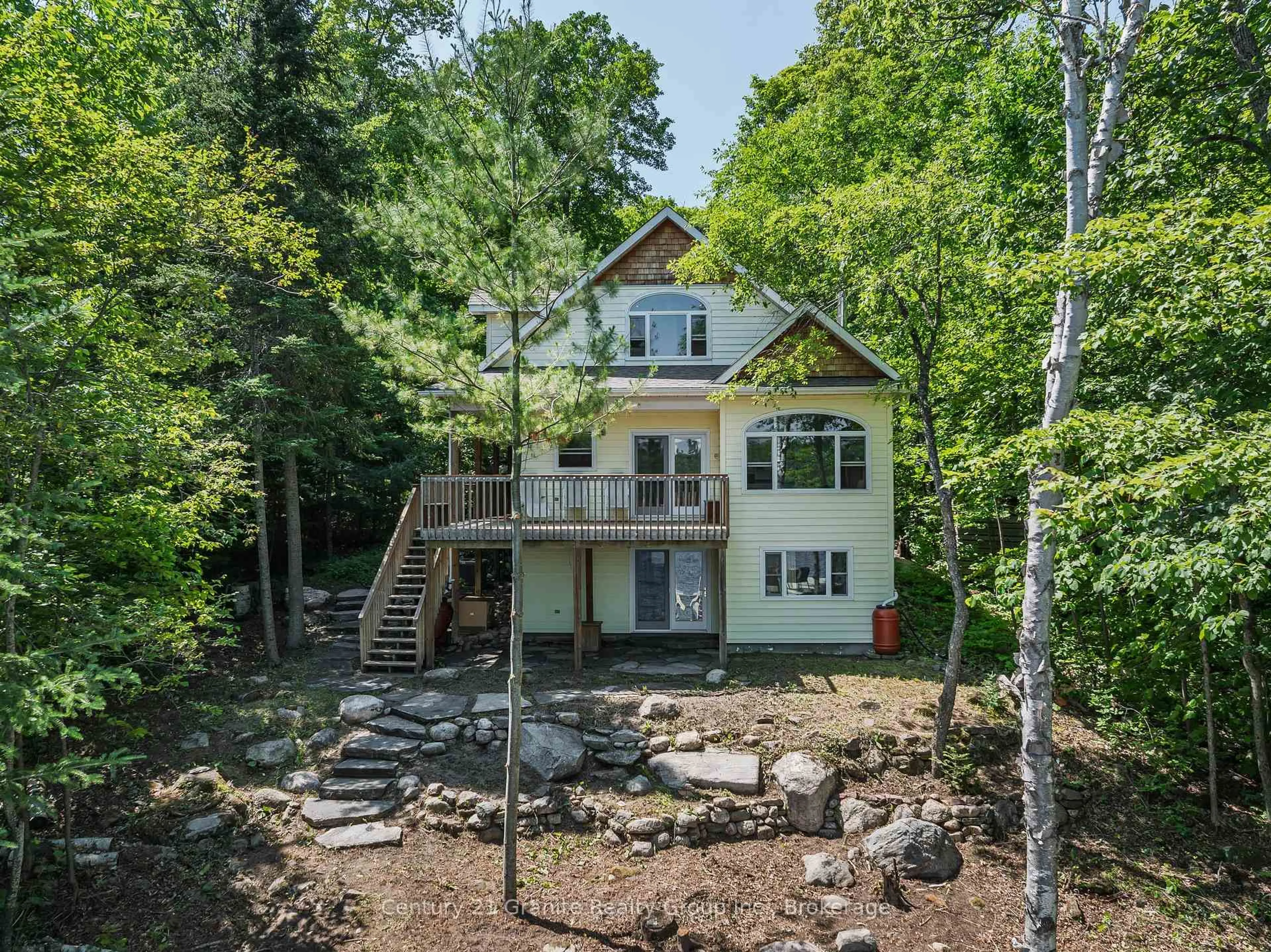 A pic from outside/outdoor area/front of a property/back of a property/a pic from drone, water/lake/river/ocean view for 1014 Peekaboo Bay Lane, Dysart et al Ontario K0M 1S0