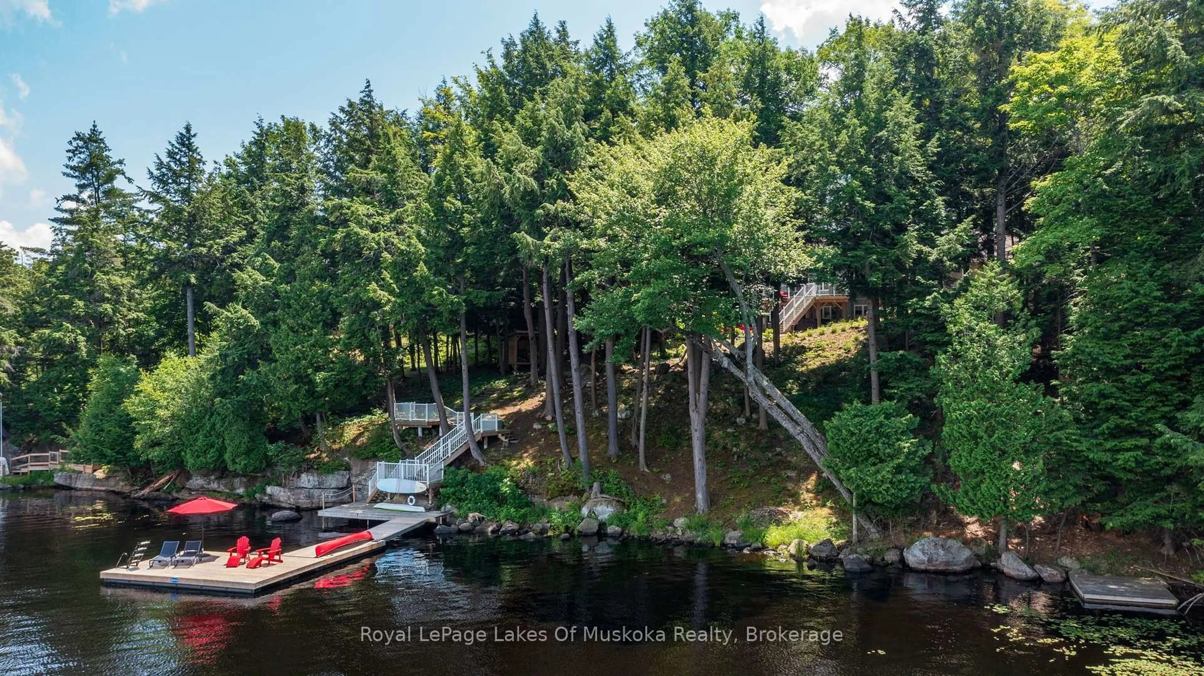 A pic from outside/outdoor area/front of a property/back of a property/a pic from drone, water/lake/river/ocean view for 1047 Brandy Crest Rd, Muskoka Lakes Ontario P0B 1J0