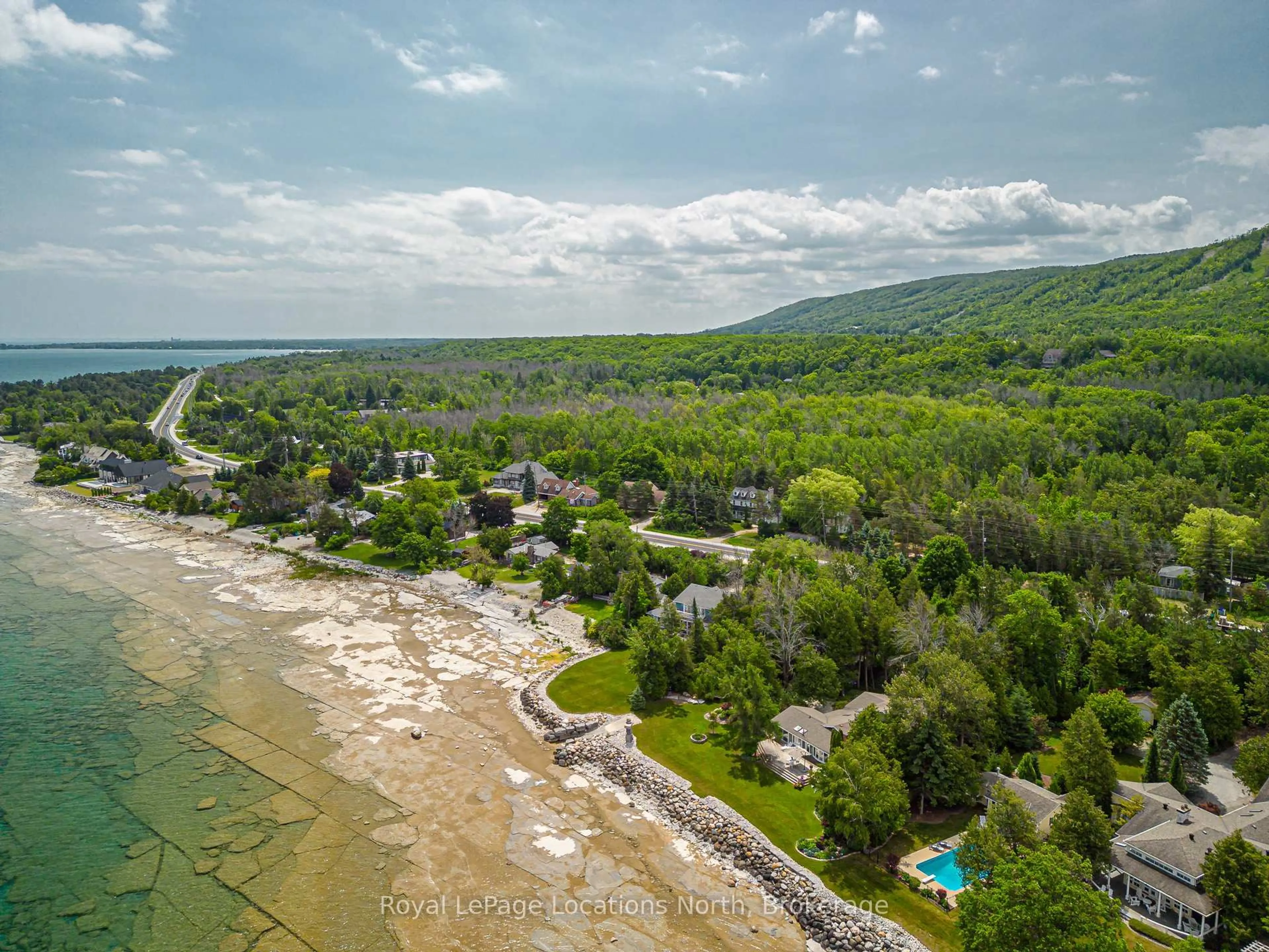 A pic from outside/outdoor area/front of a property/back of a property/a pic from drone, water/lake/river/ocean view for 209297 26 Highway, Blue Mountains Ontario L9Y 3Z2