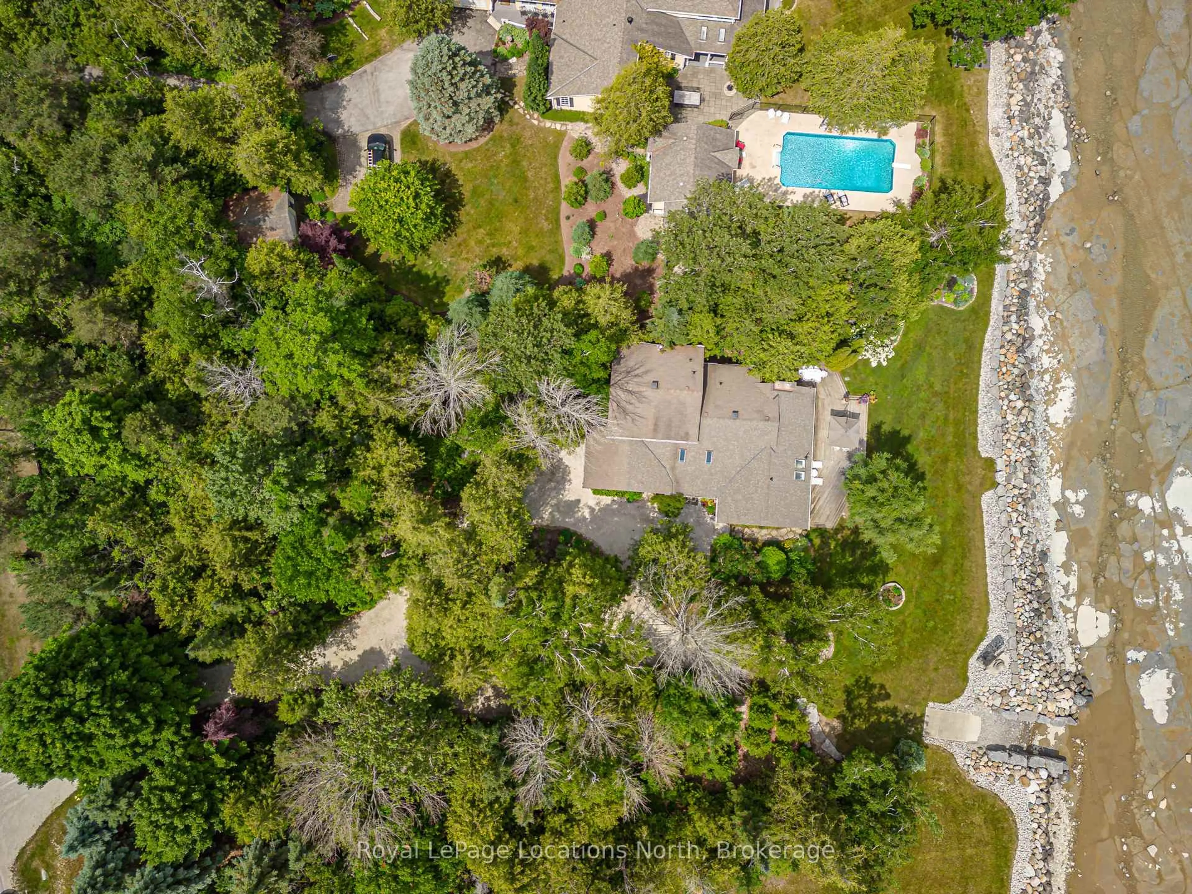 A pic from outside/outdoor area/front of a property/back of a property/a pic from drone, forest/trees view for 209297 26 Highway, Blue Mountains Ontario L9Y 3Z2