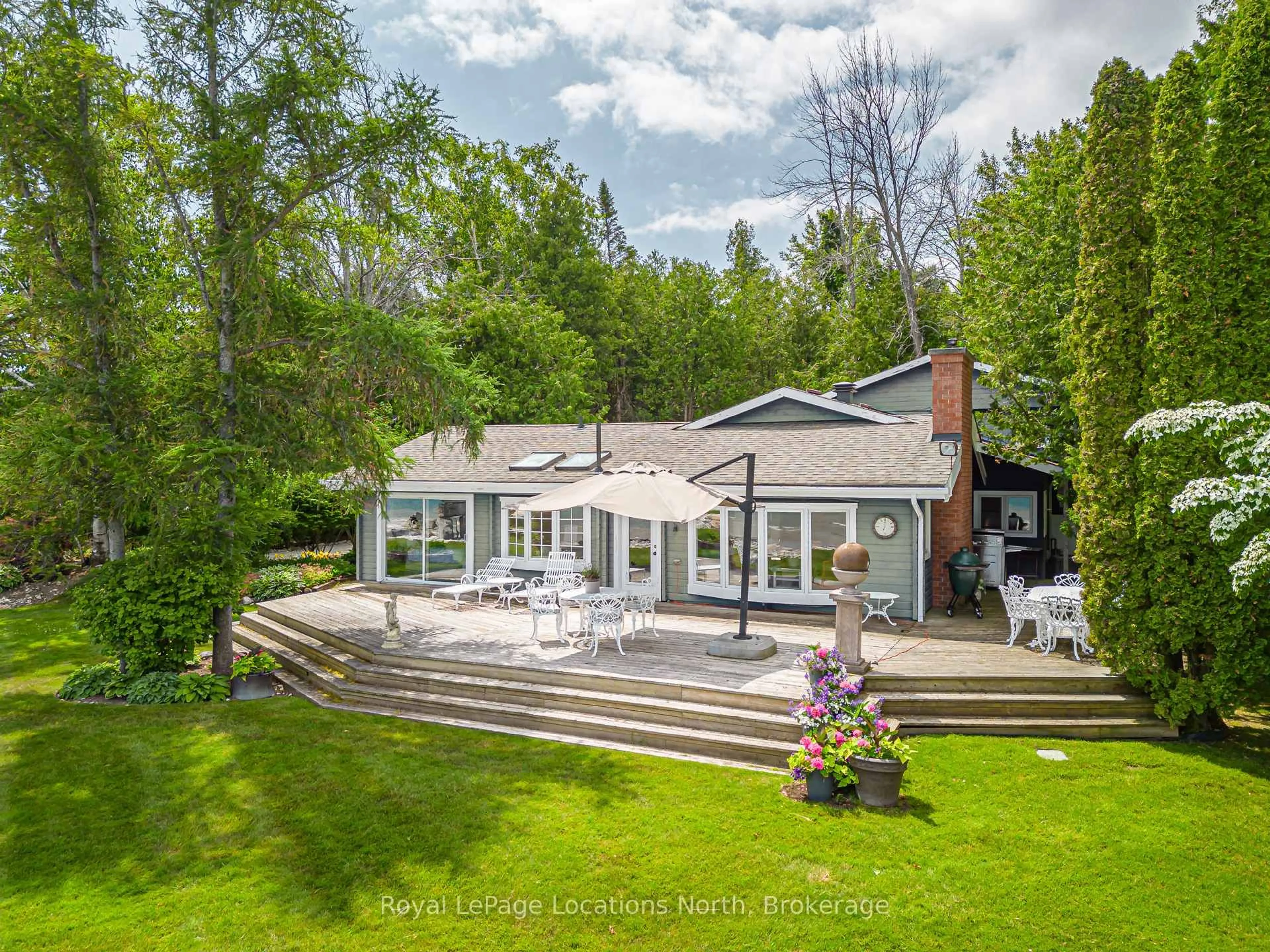 A pic from outside/outdoor area/front of a property/back of a property/a pic from drone, water/lake/river/ocean view for 209297 26 Highway, Blue Mountains Ontario L9Y 3Z2