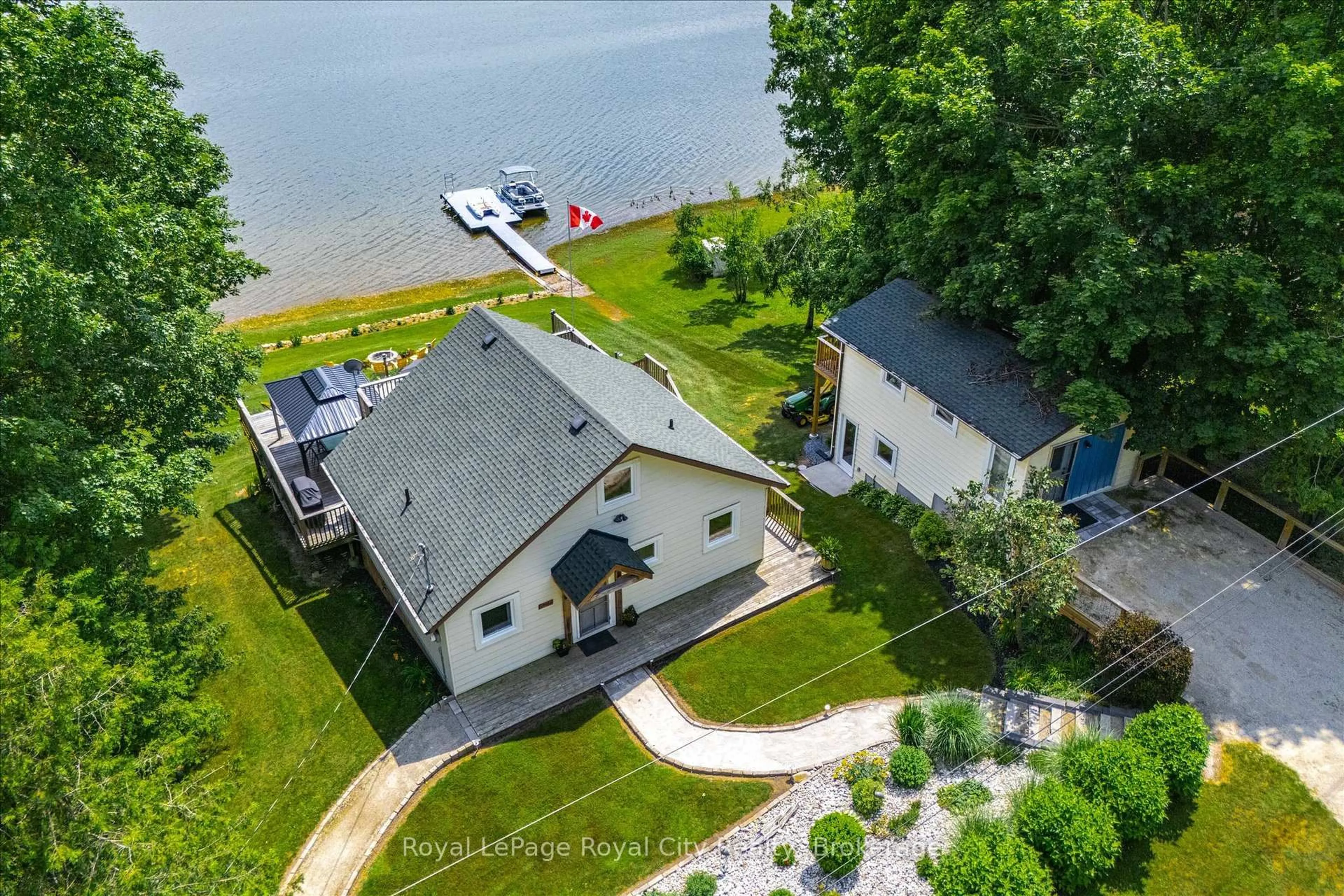 A pic from outside/outdoor area/front of a property/back of a property/a pic from drone, water/lake/river/ocean view for 614 Road 6 East Rd, Mapleton Ontario N0G 2K0
