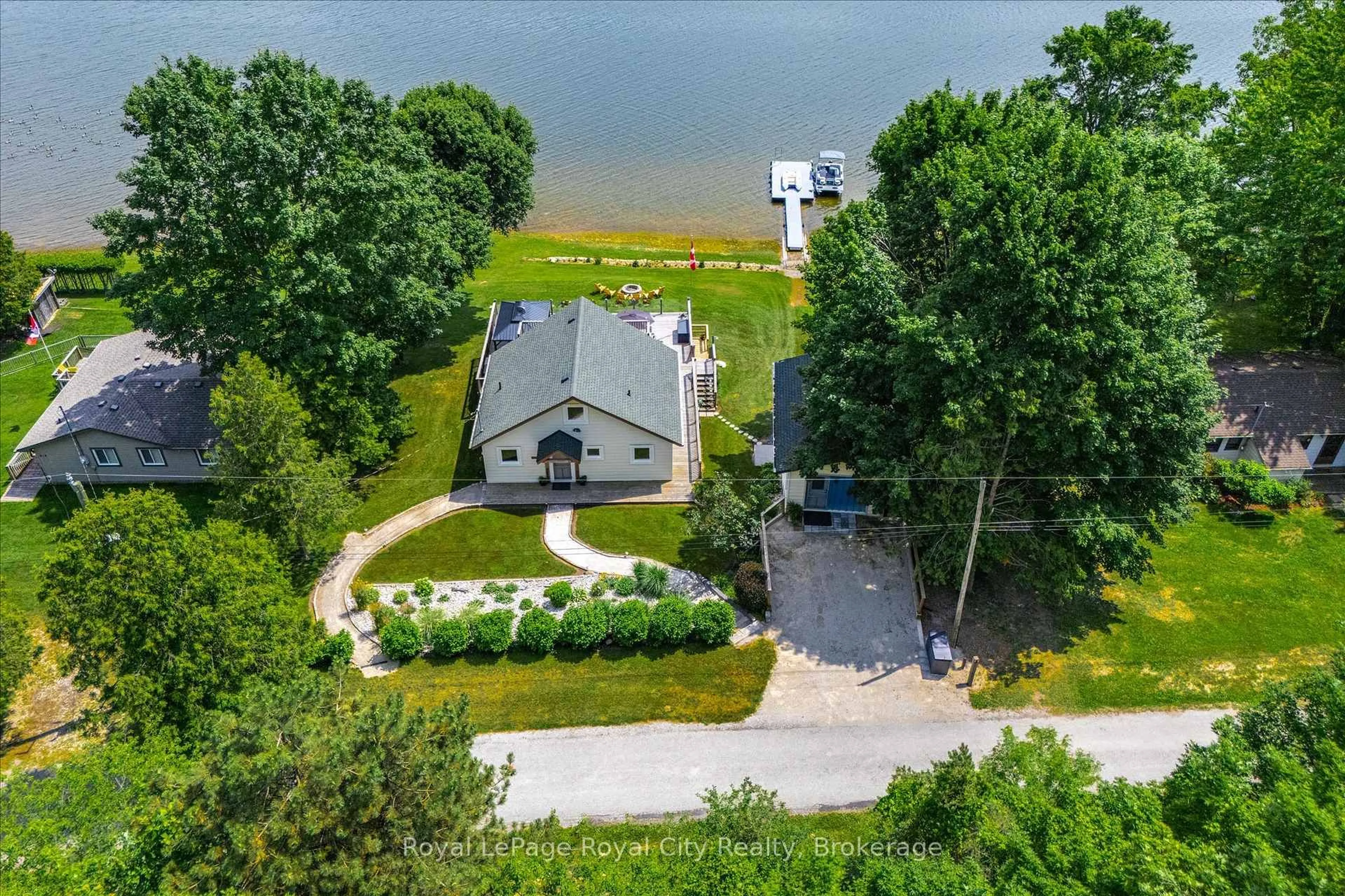 A pic from outside/outdoor area/front of a property/back of a property/a pic from drone, water/lake/river/ocean view for 614 Road 6 East Rd, Mapleton Ontario N0G 2K0